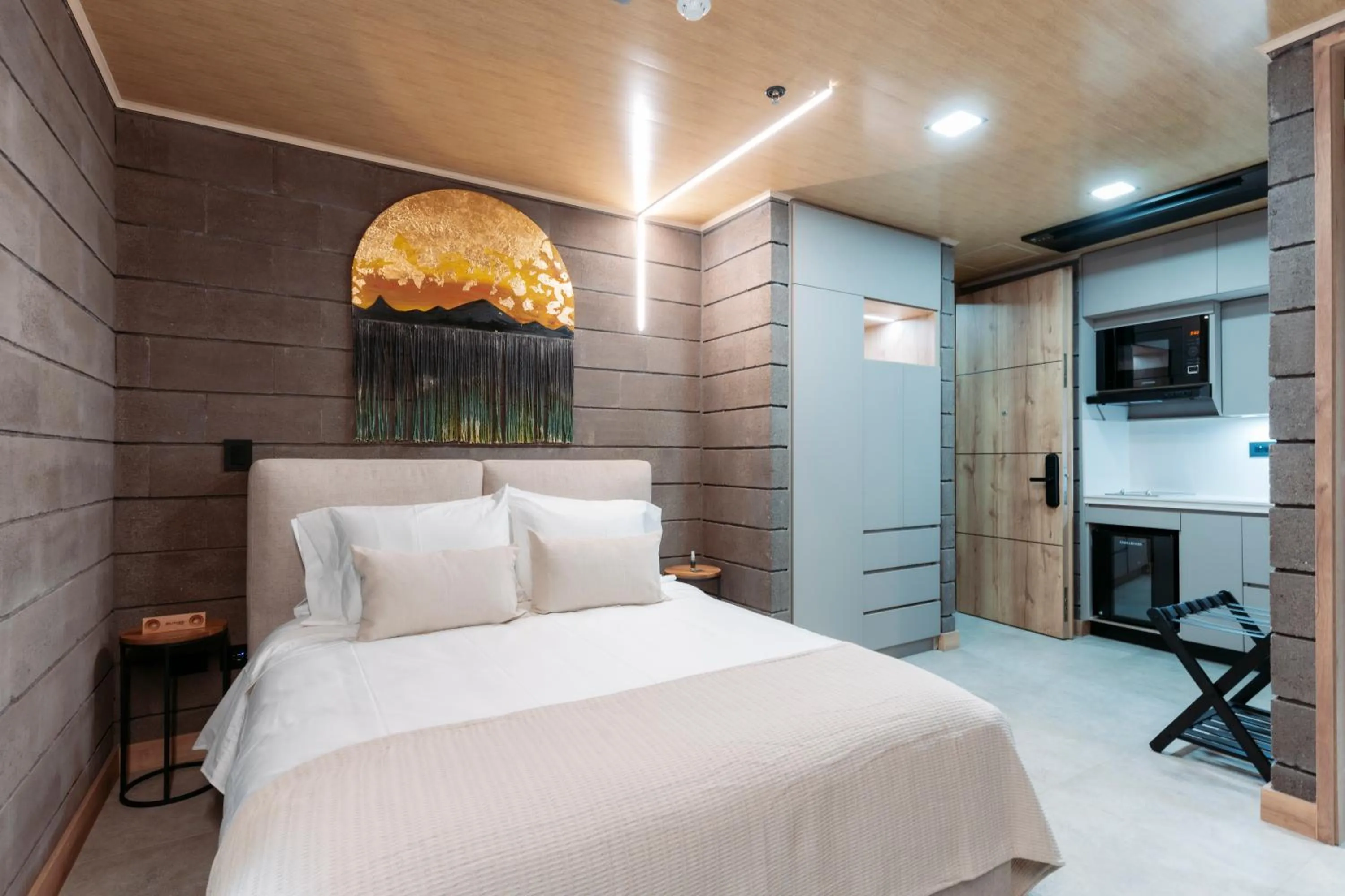 Bed in Hotel Living by Armoniko