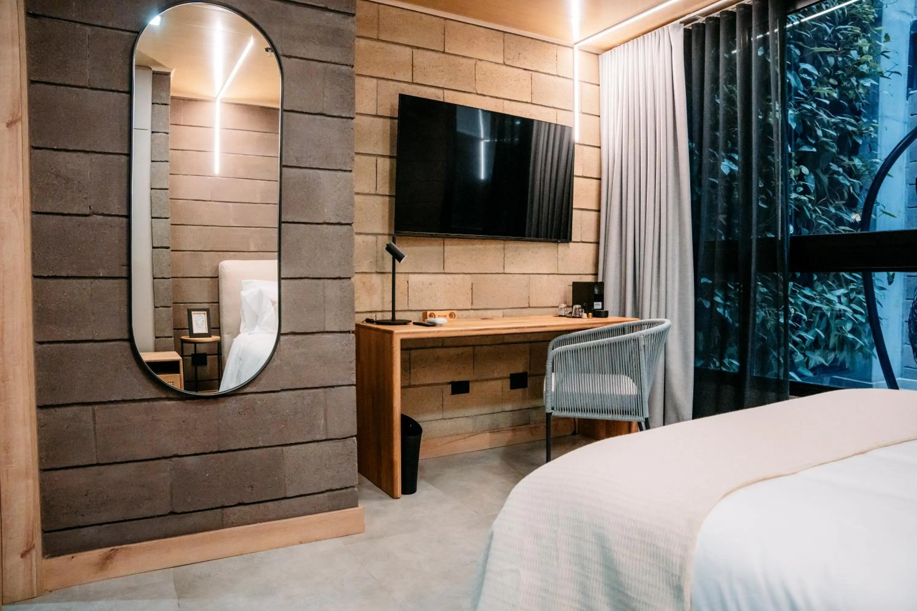 Bed in Hotel Living by Armoniko