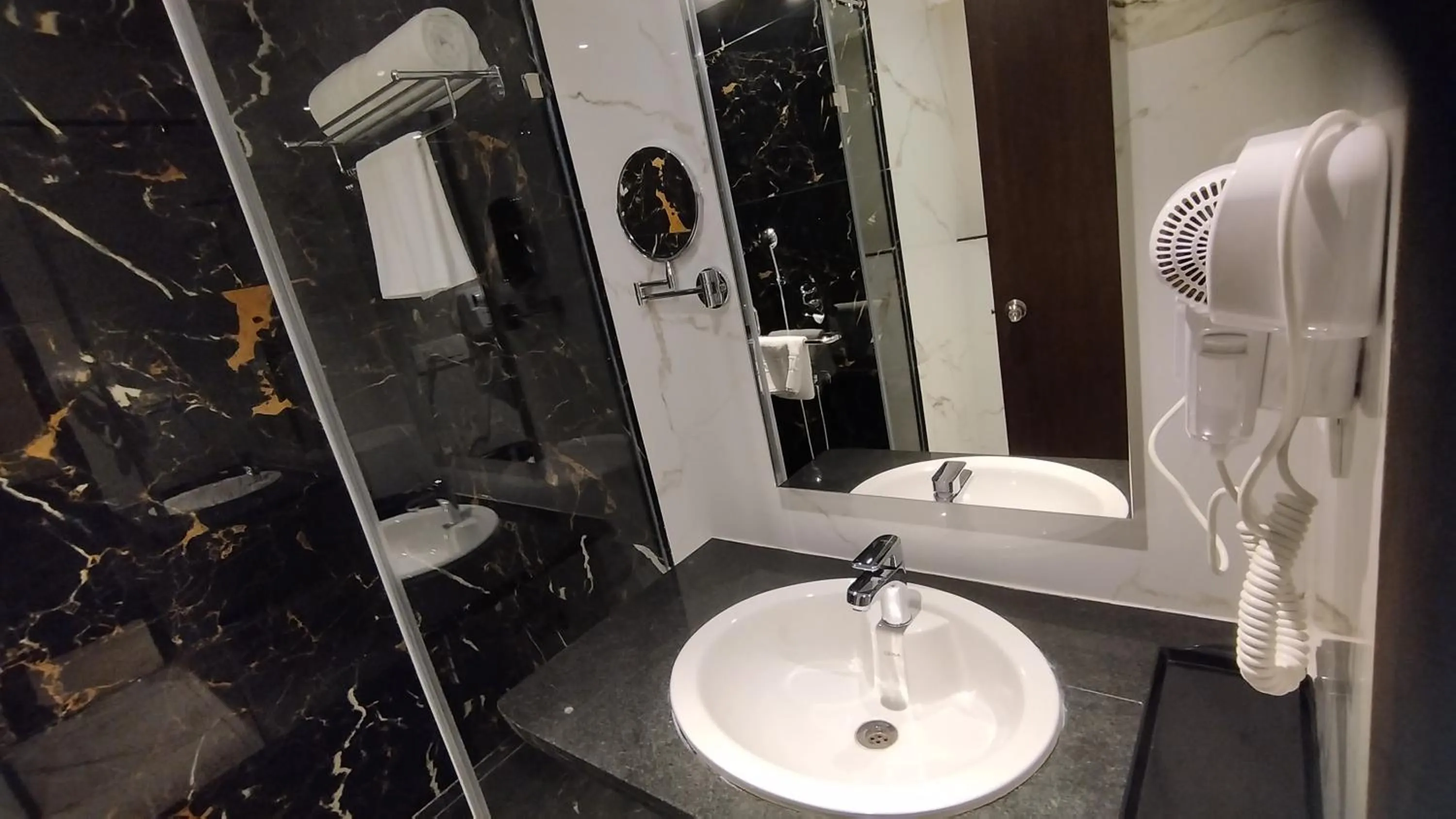 Bathroom in Mayur Belgaum Presidency Hotel & Spa