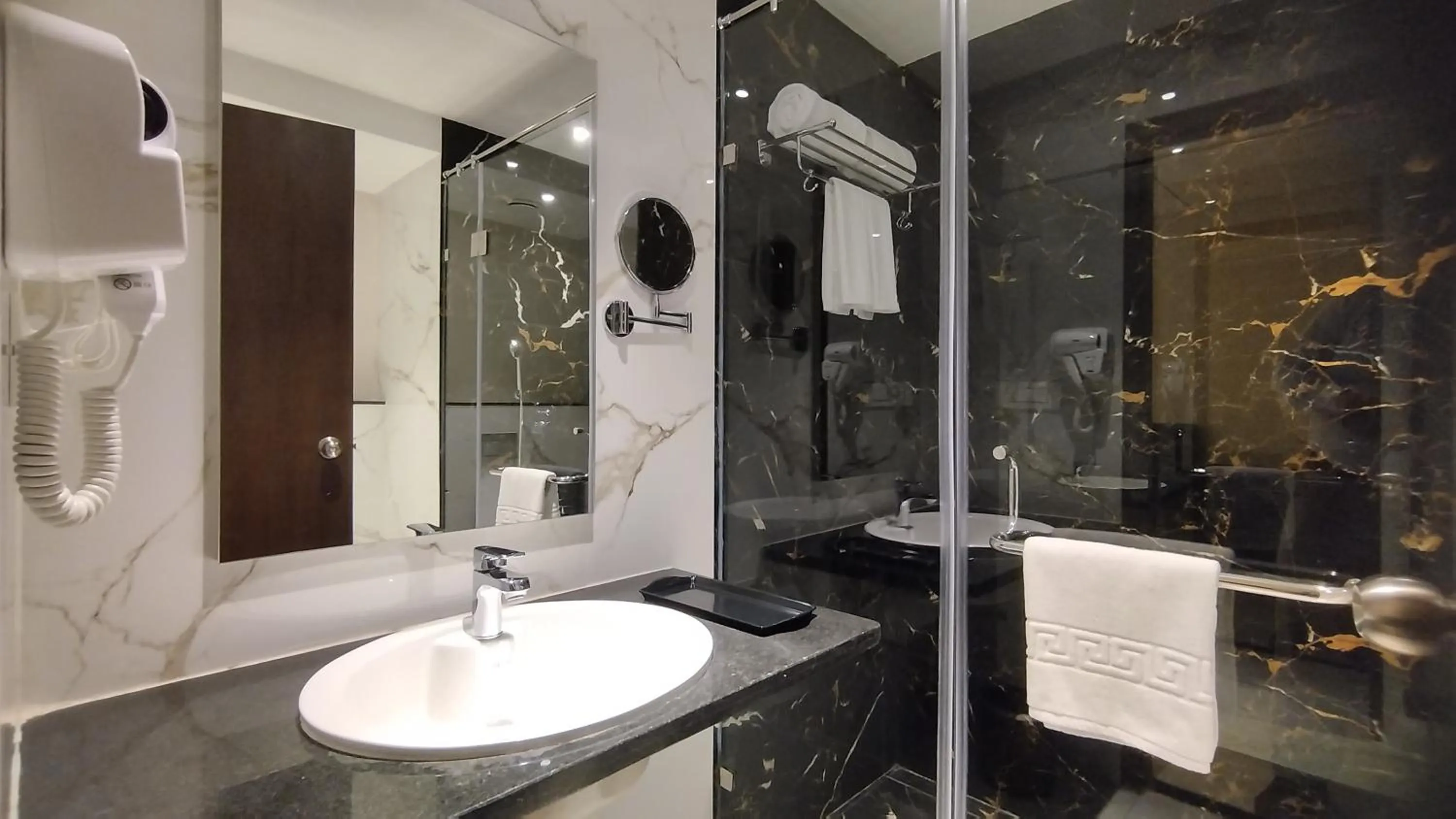 Bathroom in Mayur Belgaum Presidency Hotel & Spa