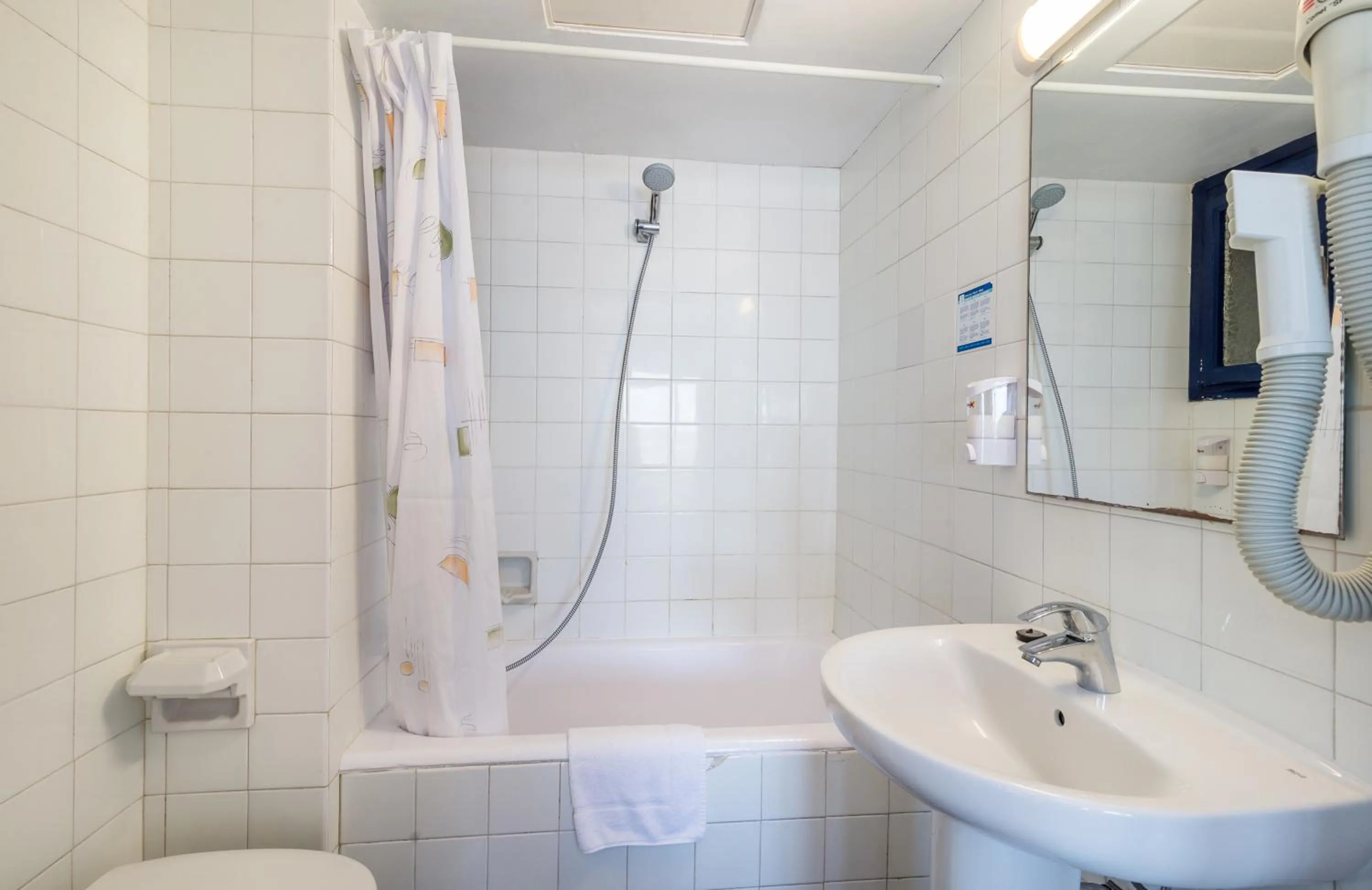 Bathroom in Hotel & Diving Les Illes