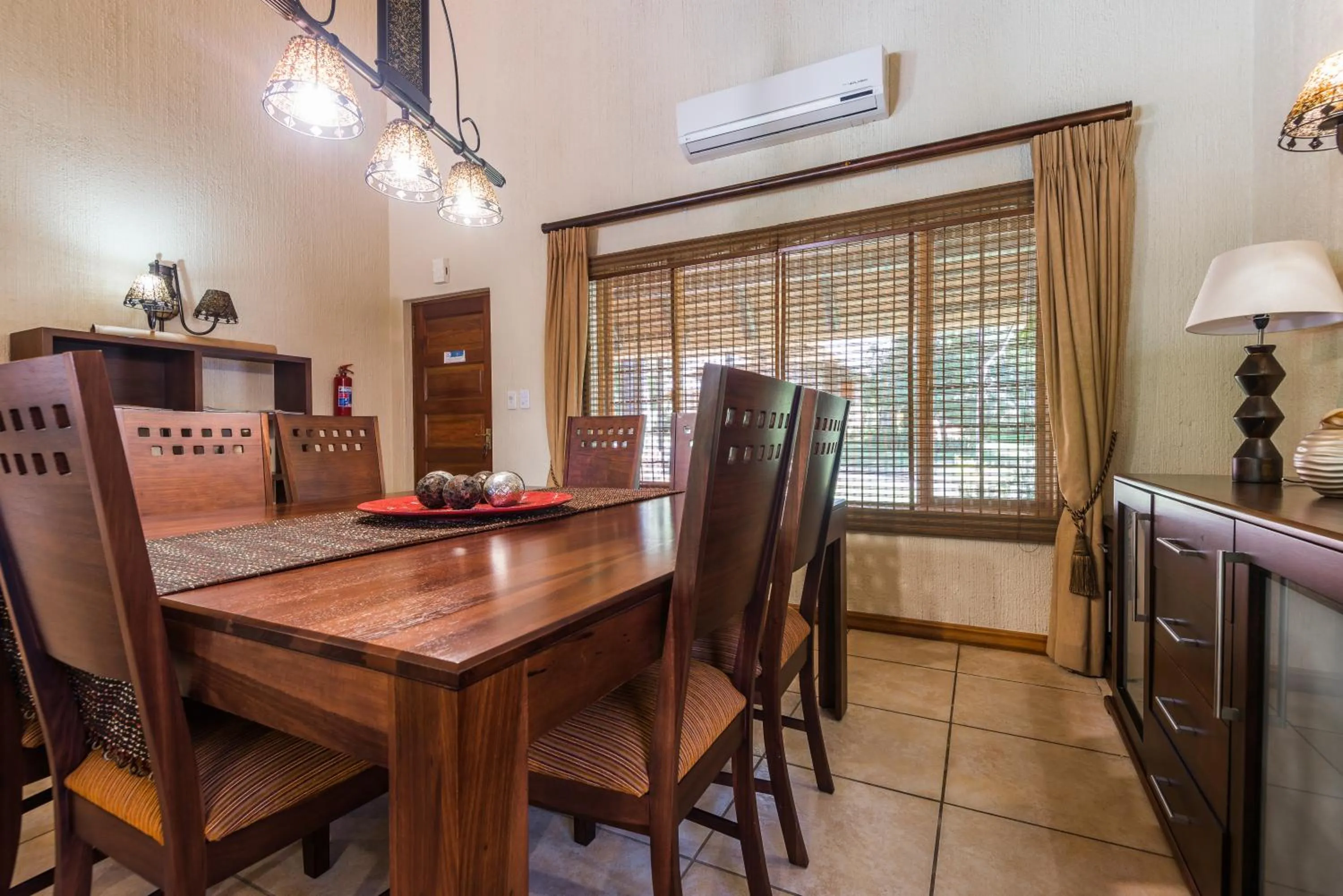 Dining area in Kruger Park Lodge Unit No 521 with Private Pool