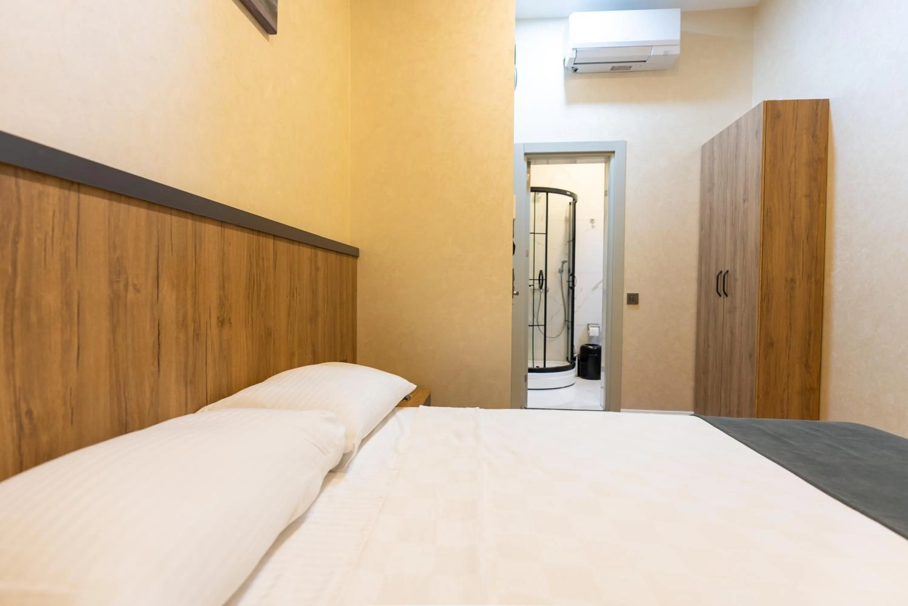 Bed in Valens Boutique Hotel