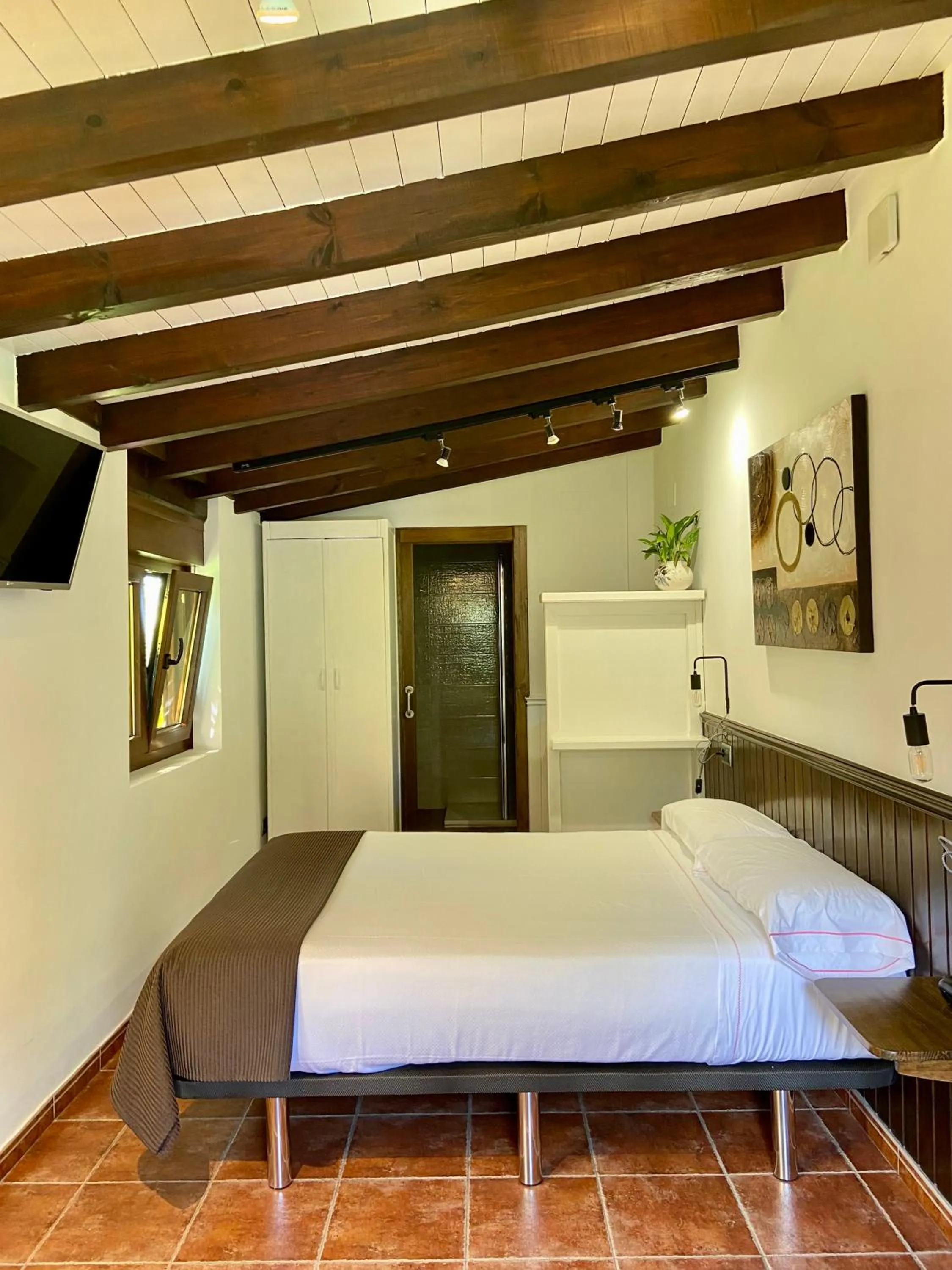 Bed in Hotel La Arquera