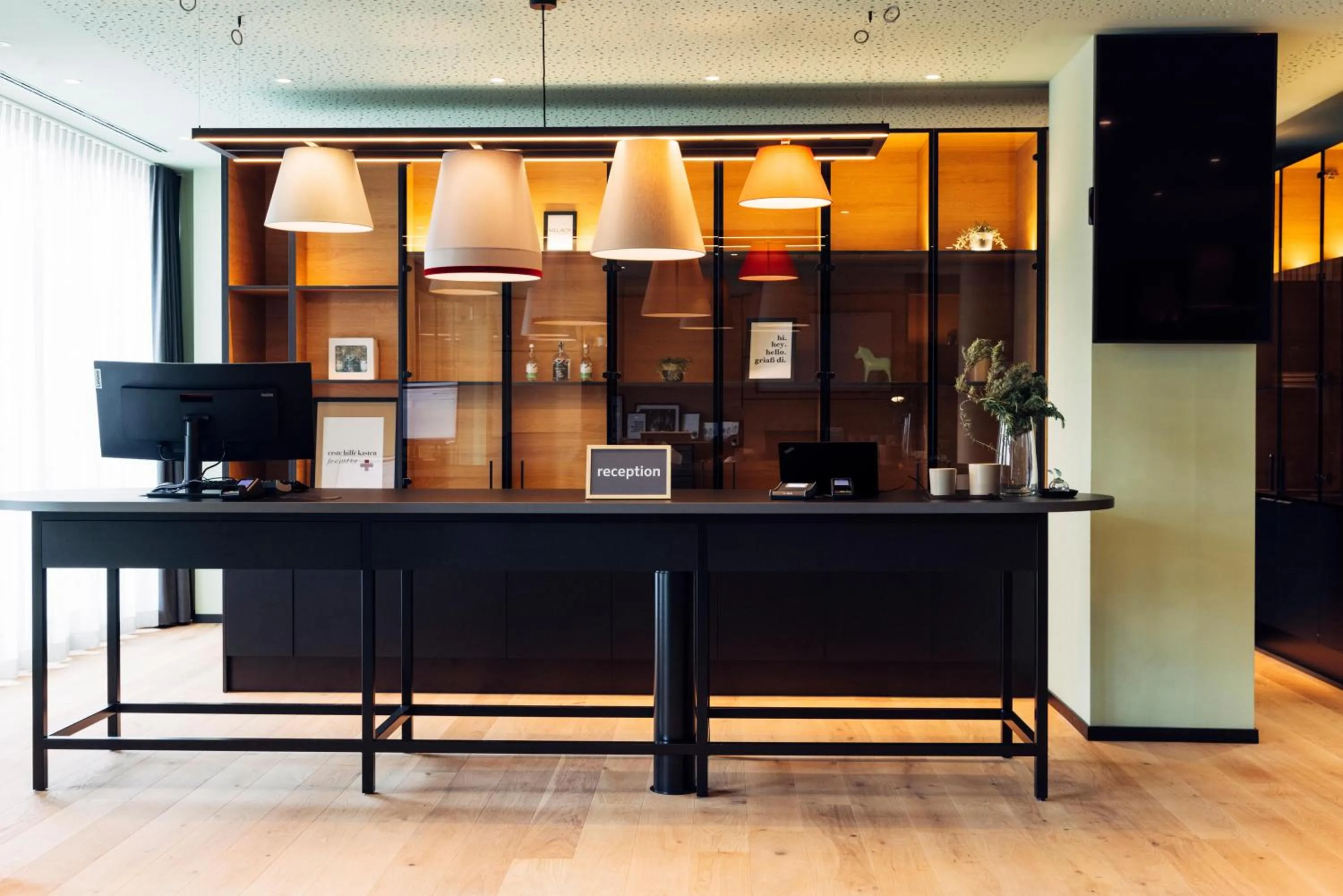 Lobby or reception in harry's home Villach hotel & apartments