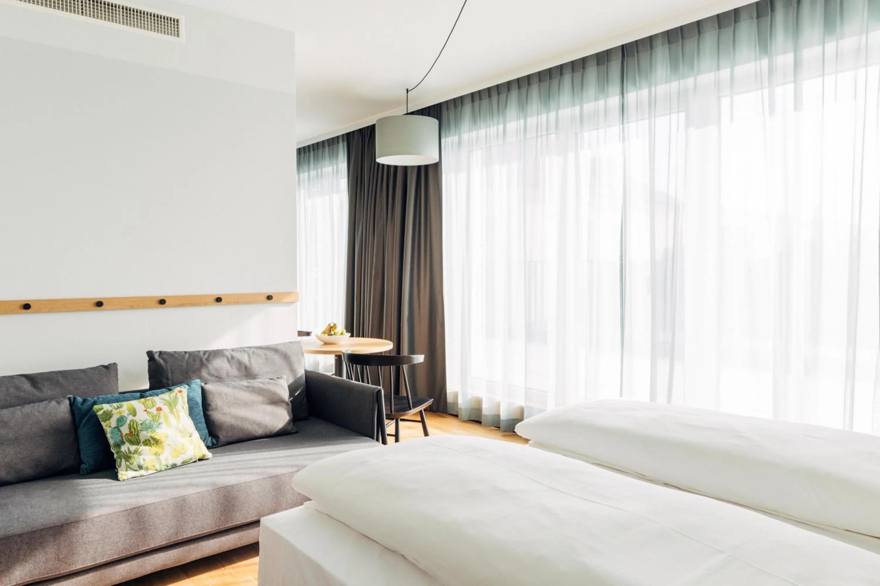 Photo of the whole room, Bed in harry's home Villach hotel & apartments