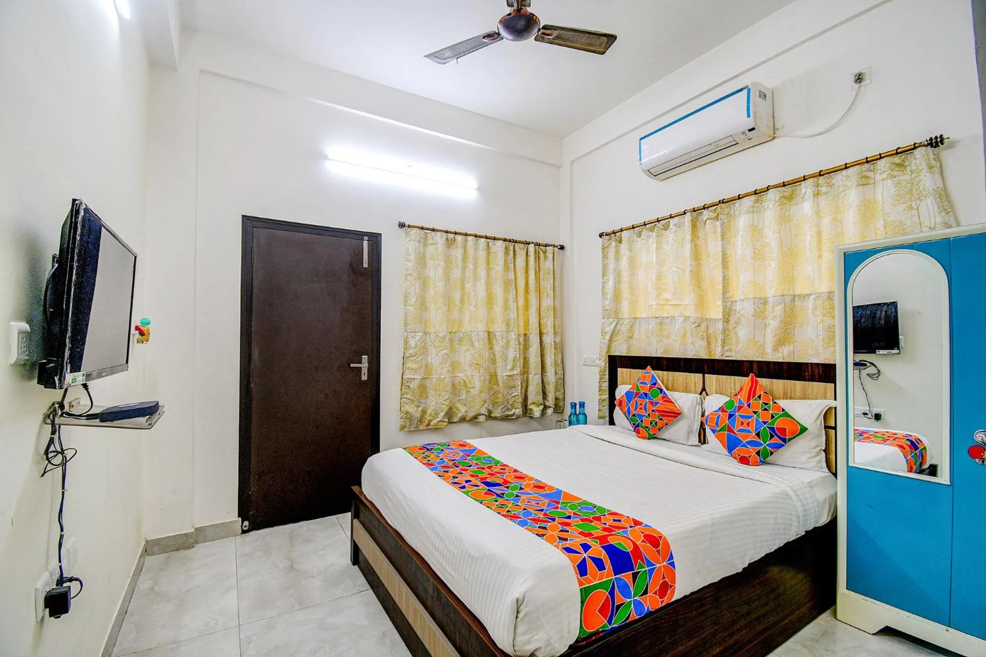 Bed in FabHotel Moon Residency