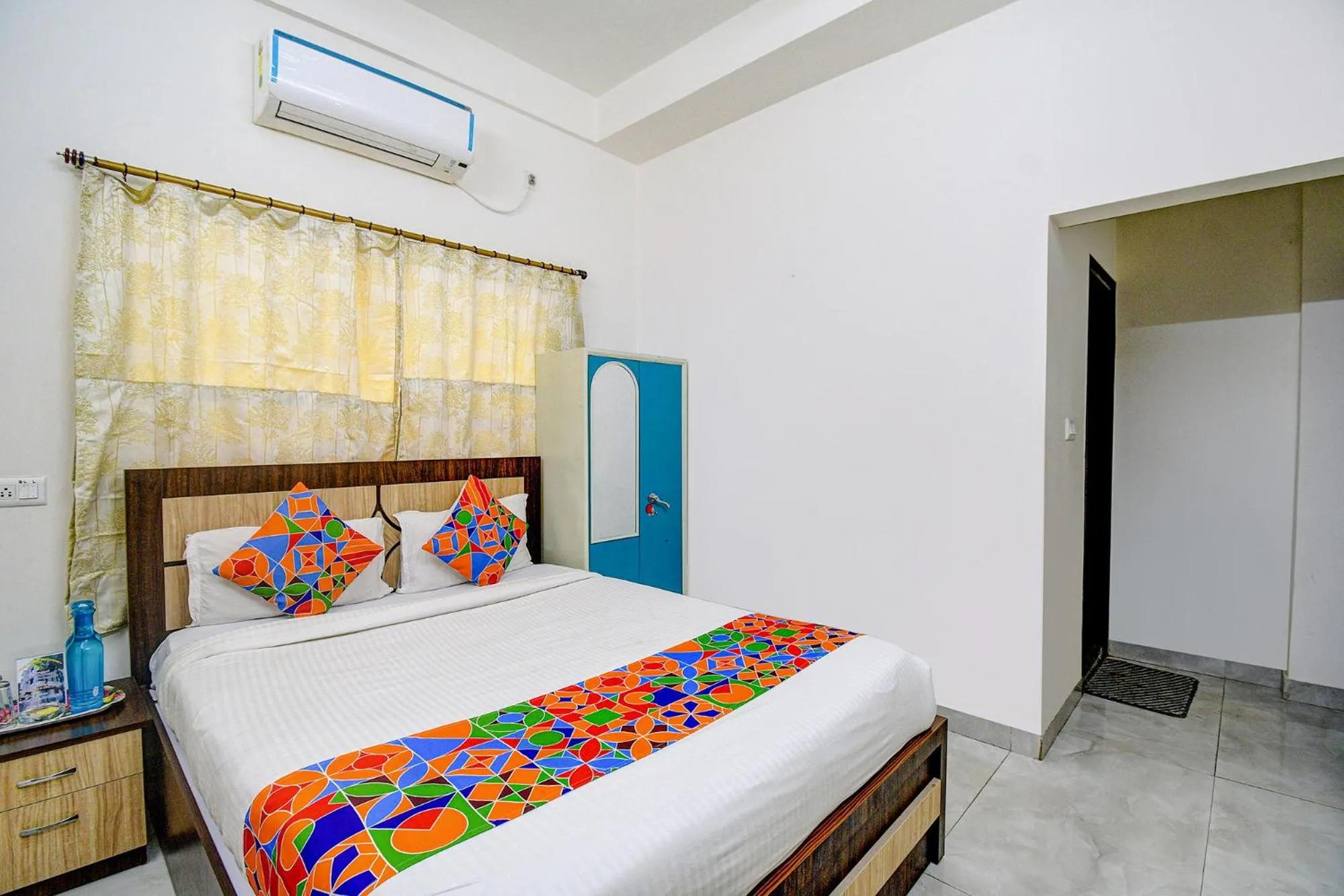 Bed in FabHotel Moon Residency