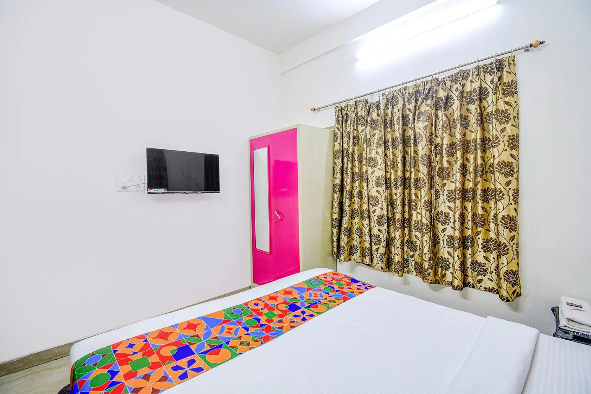 Bed in FabHotel Moon Residency