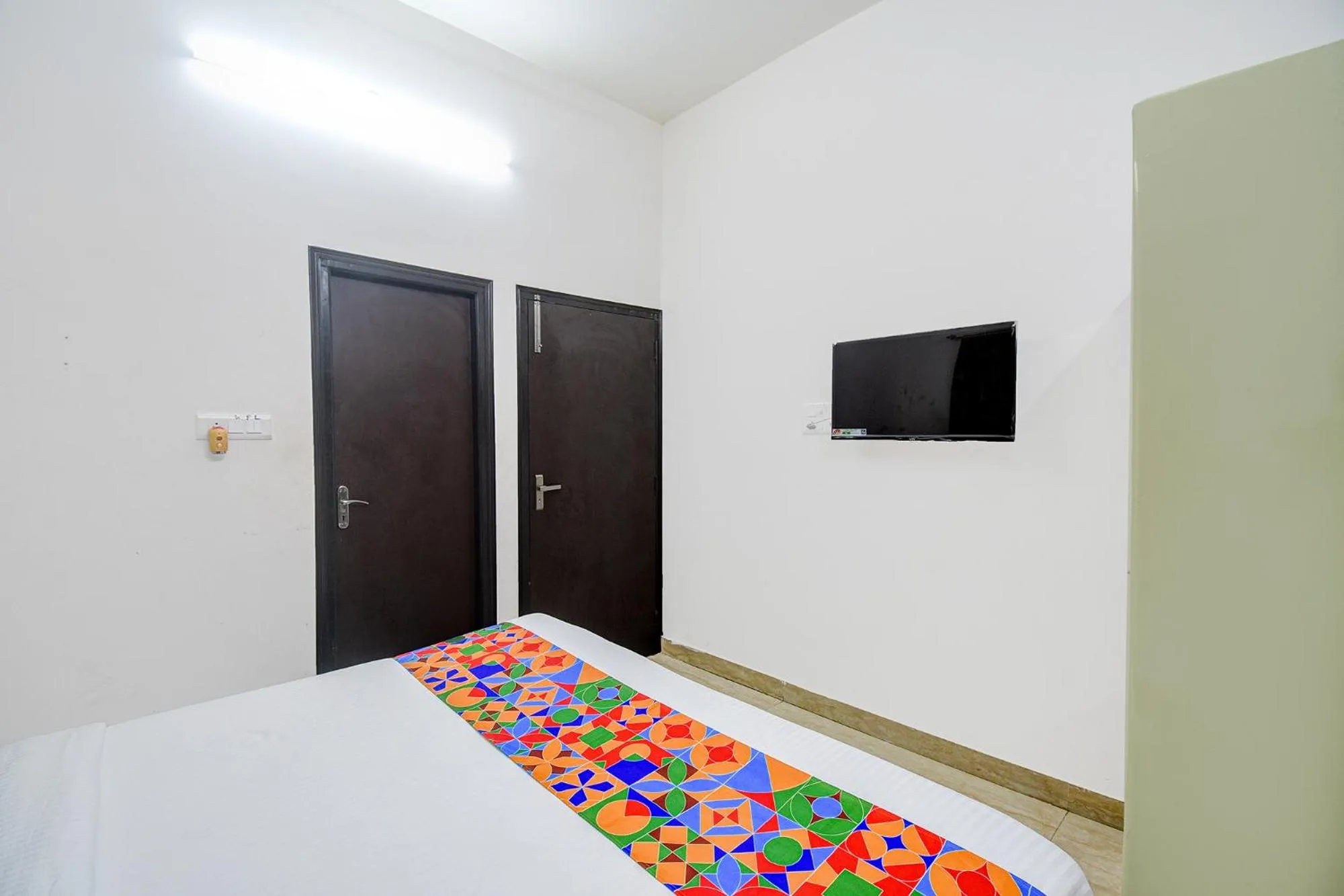 Bed in FabHotel Moon Residency