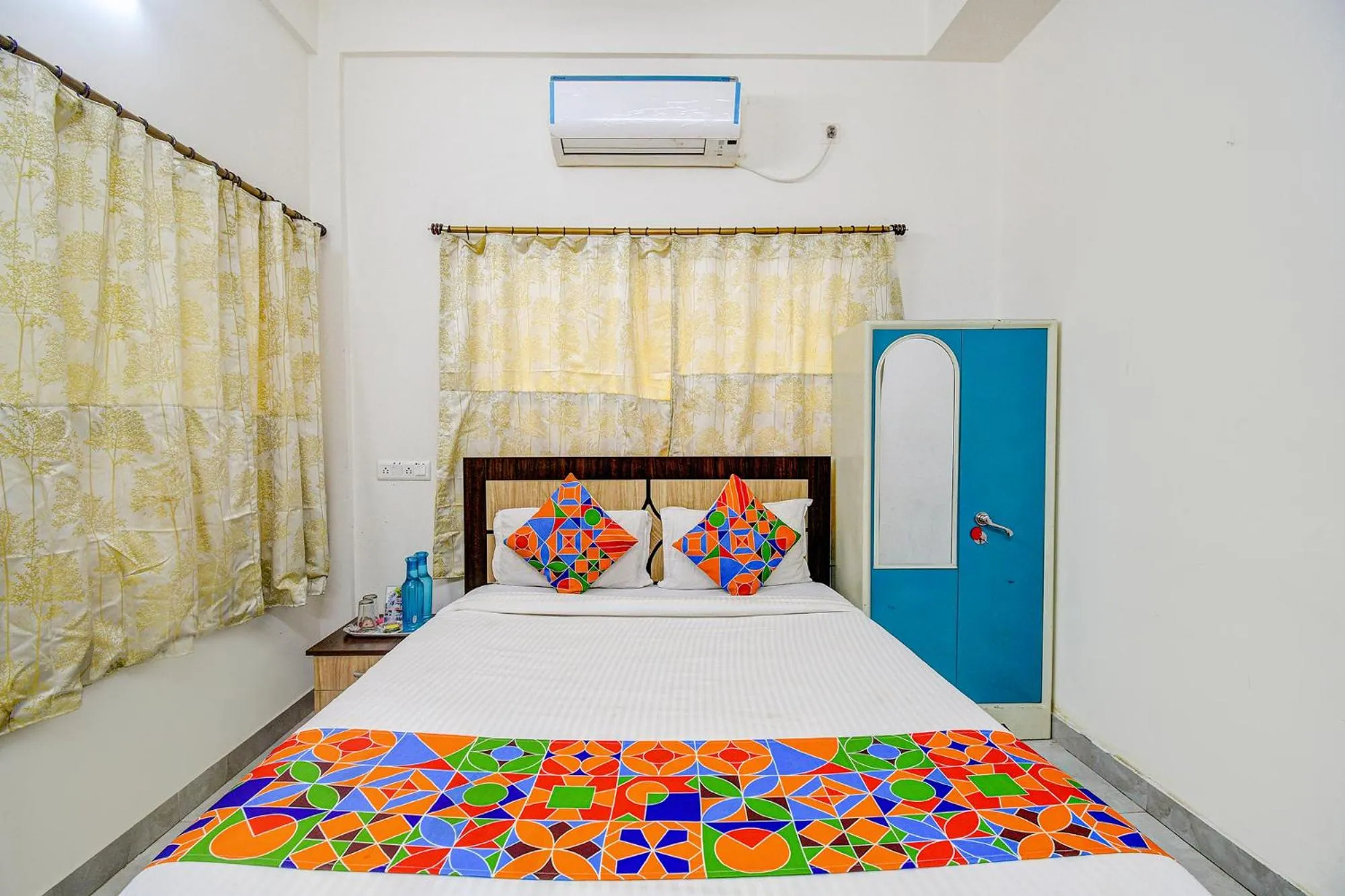 Bed in FabHotel Moon Residency