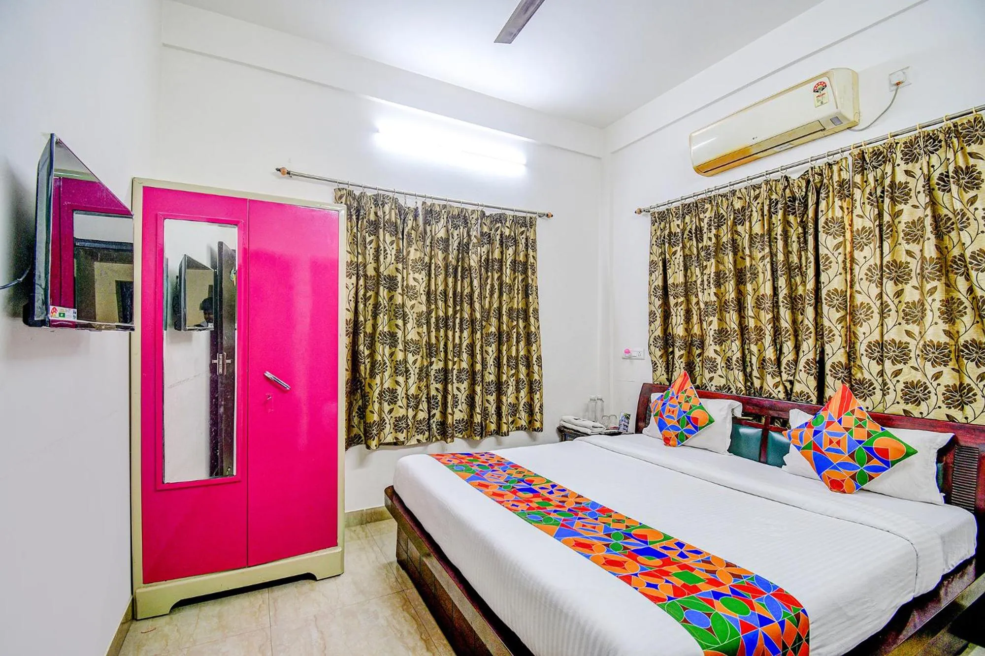 Bed in FabHotel Moon Residency