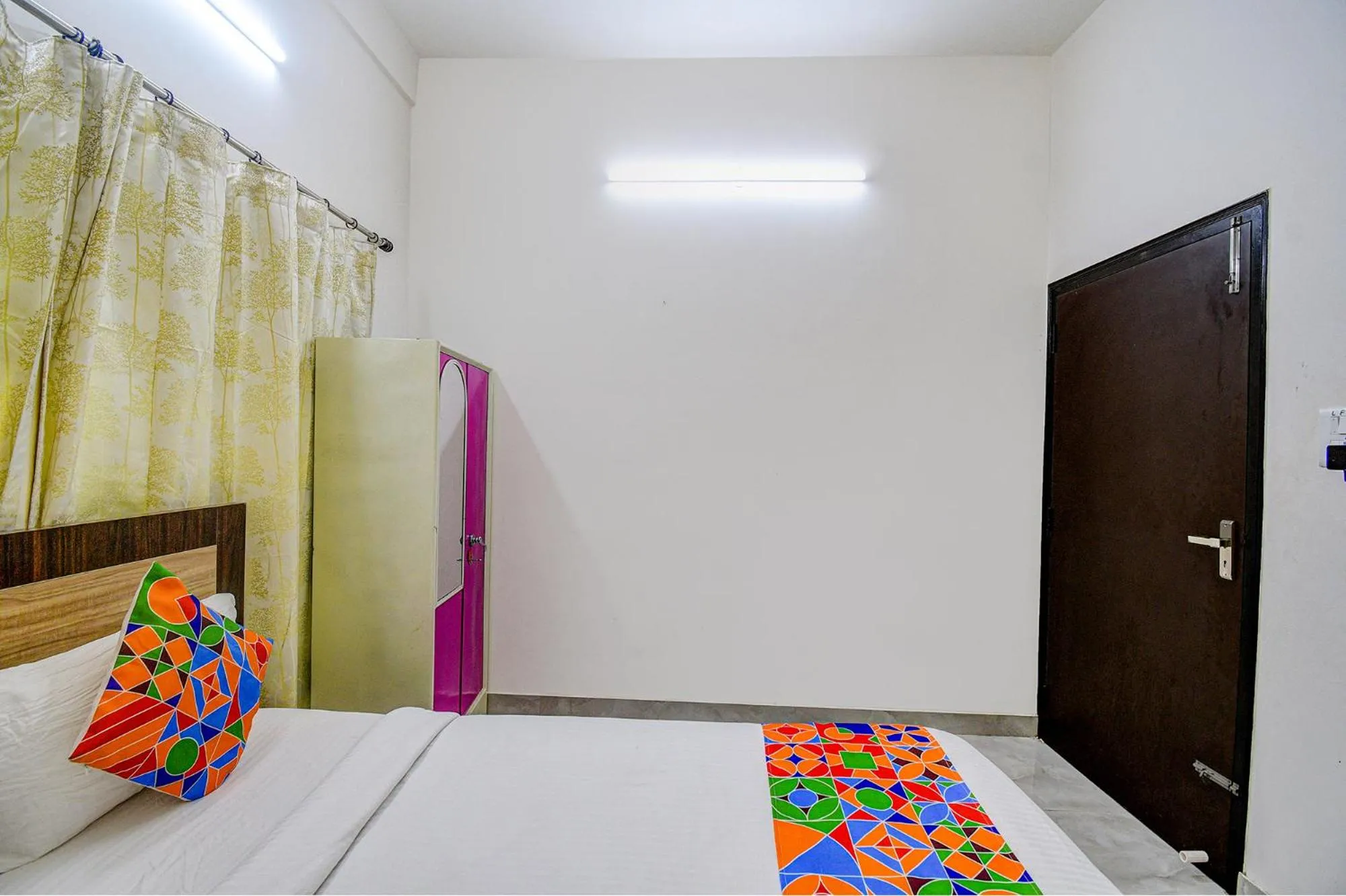 Bed in FabHotel Moon Residency