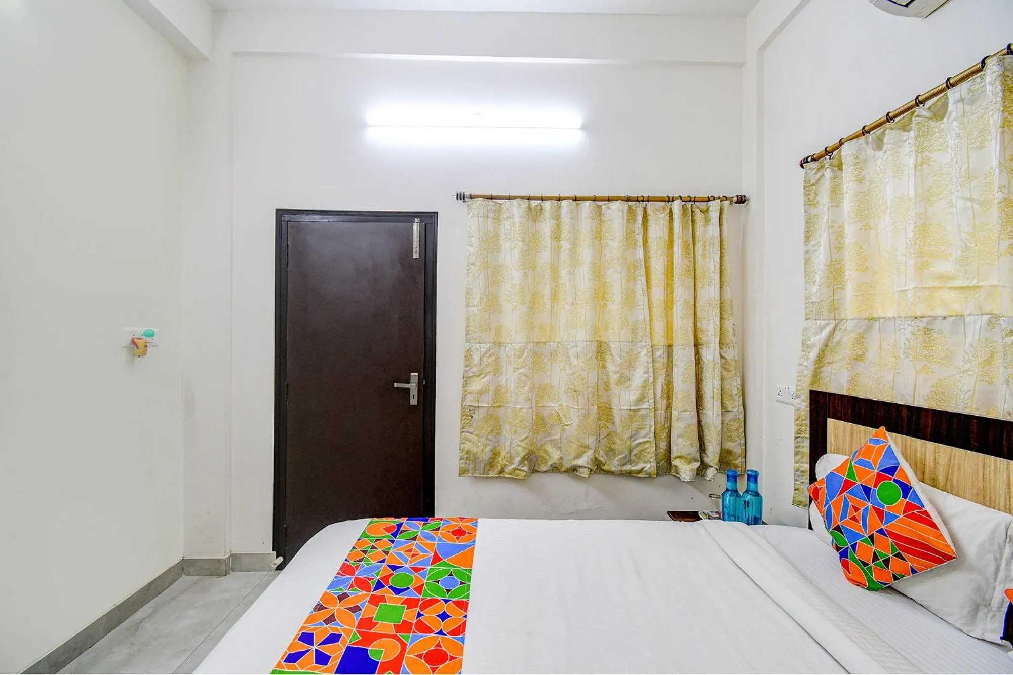 Bed in FabHotel Moon Residency