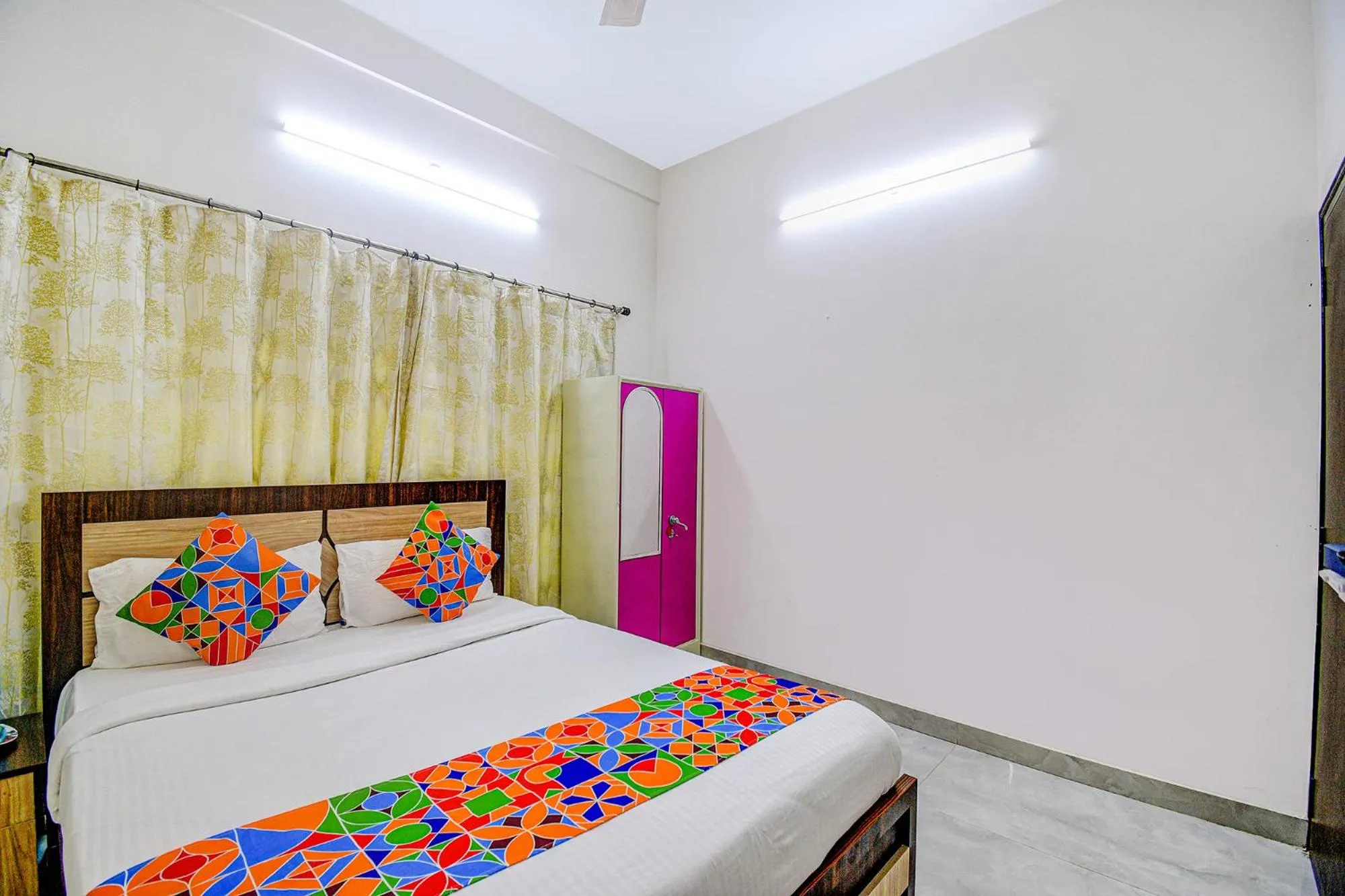 Bed in FabHotel Moon Residency