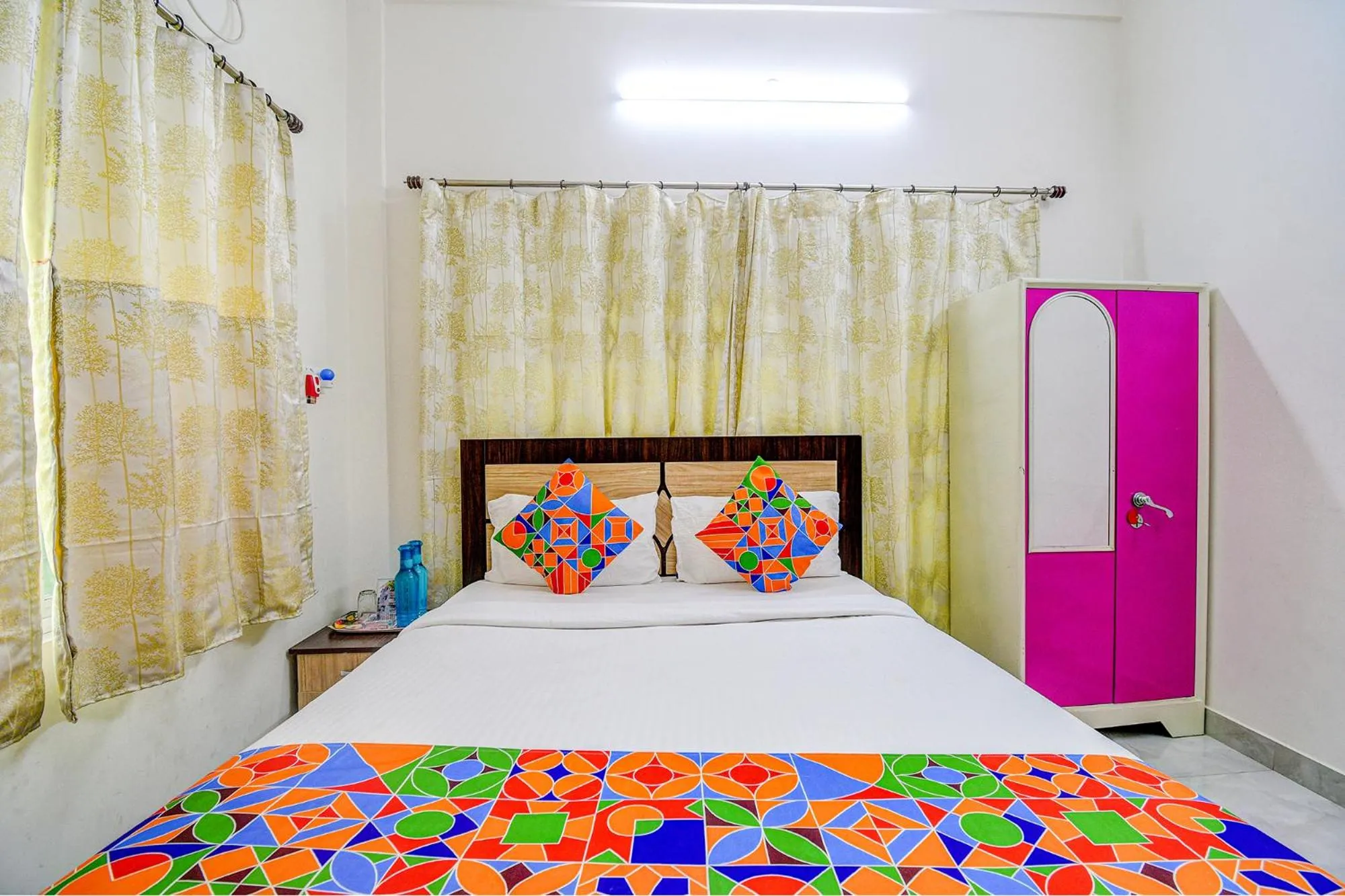 Bed in FabHotel Moon Residency