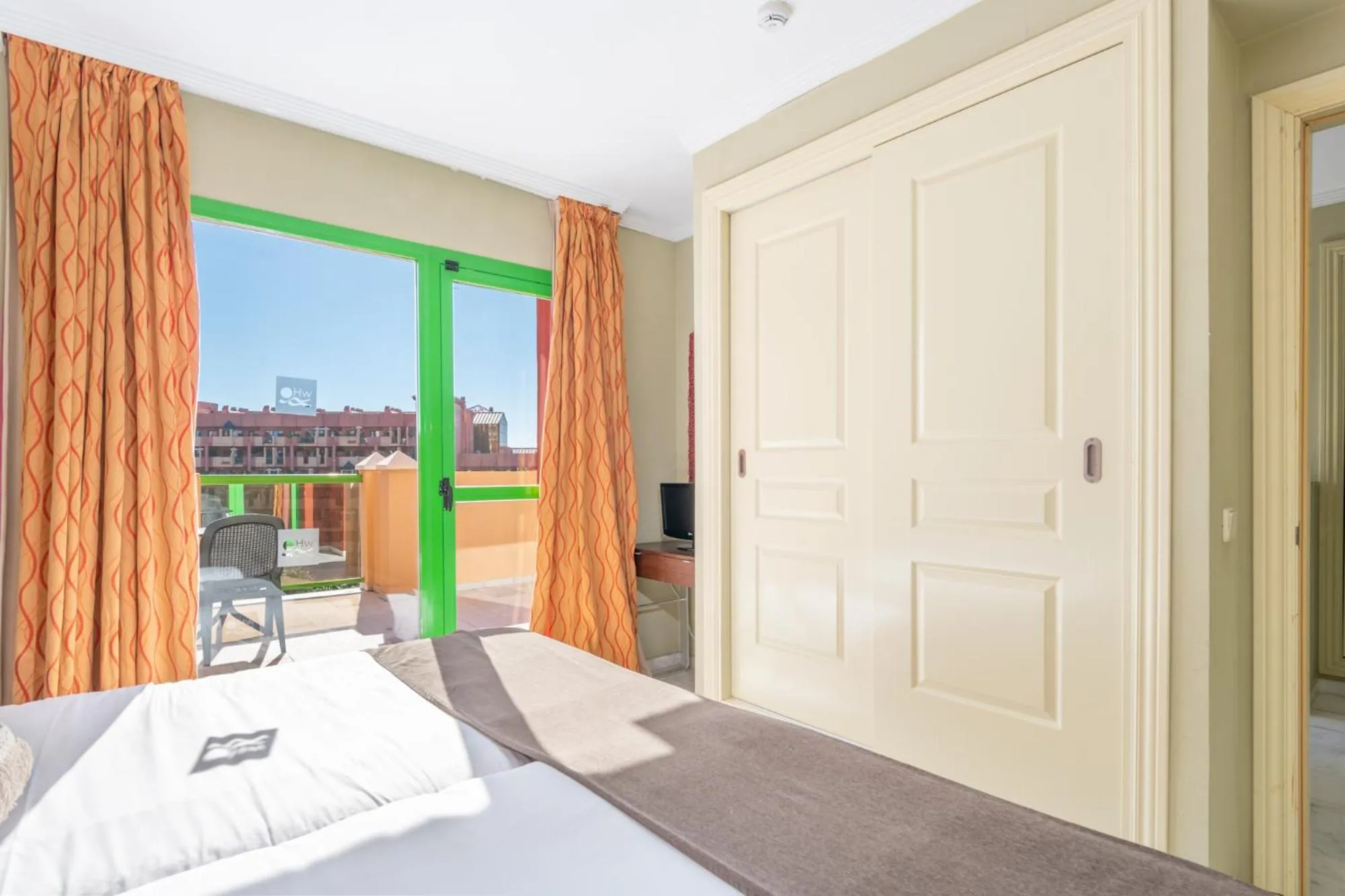 Bedroom, Bed in Holiday World RIWO Hotel.