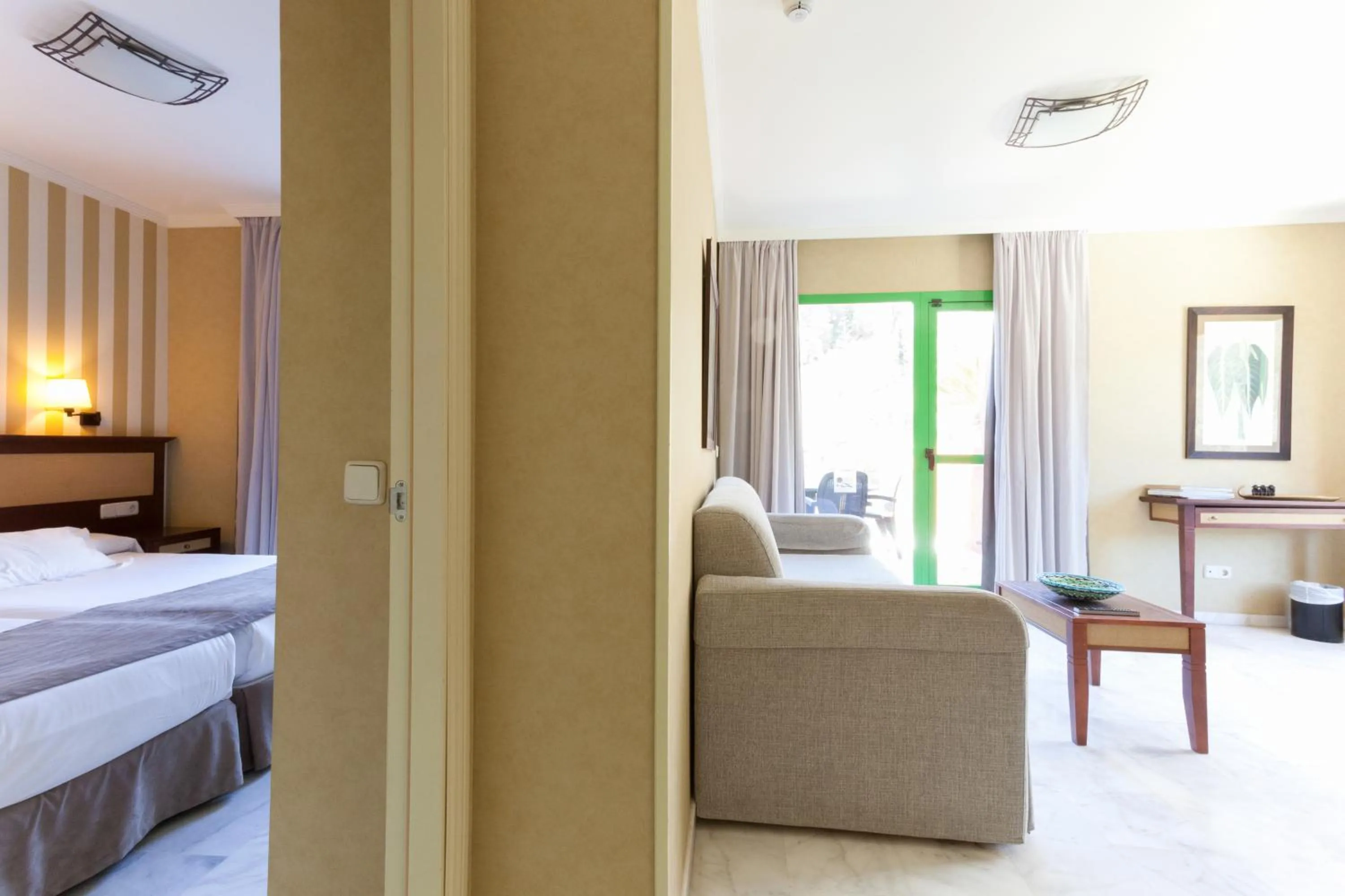 Photo of the whole room, Bed in Holiday World RIWO Hotel.