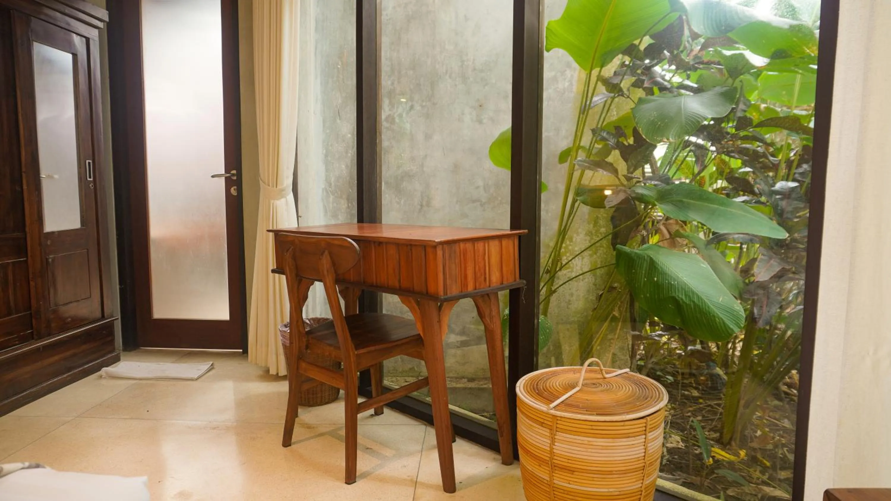 Seating area in Green Tree House Villa Ubud