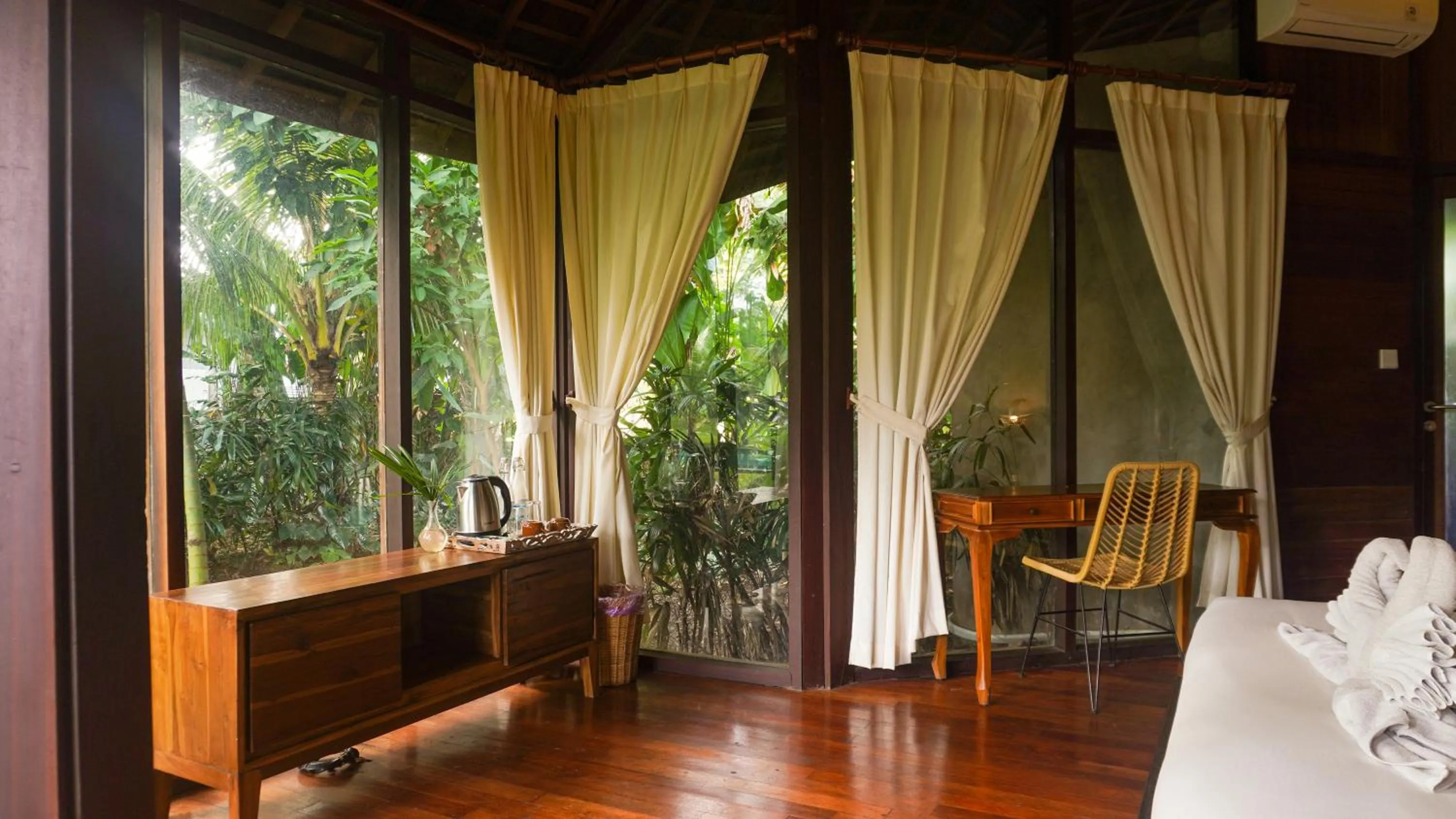 Seating area in Green Tree House Villa Ubud