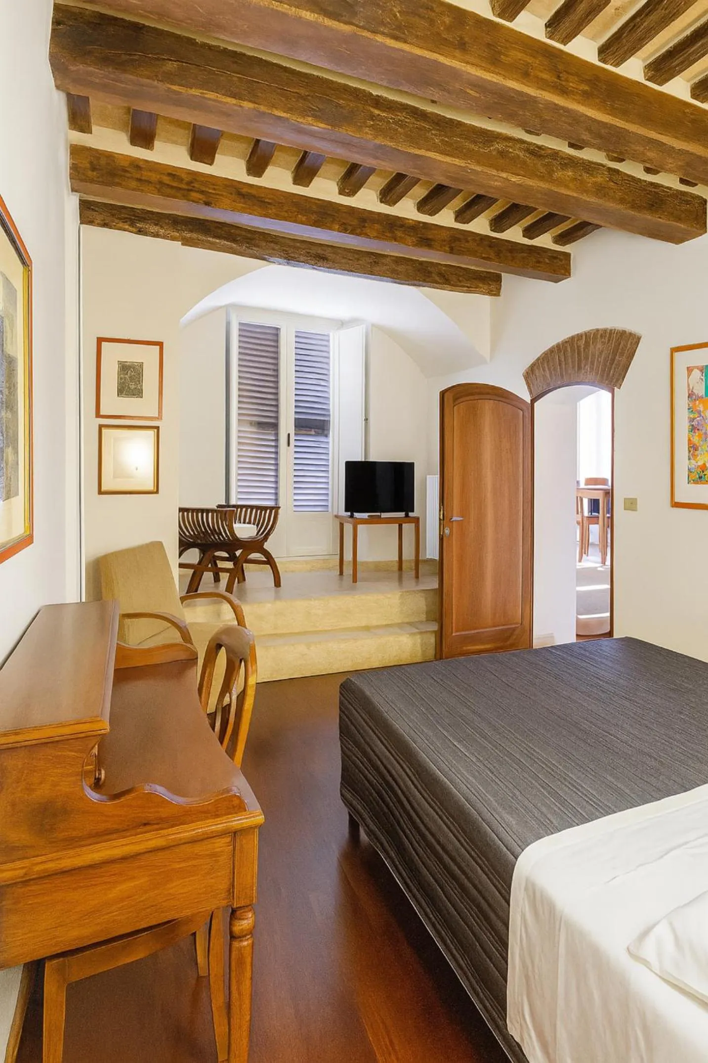 Bed in The Balcony Suite - Piazza del Campo