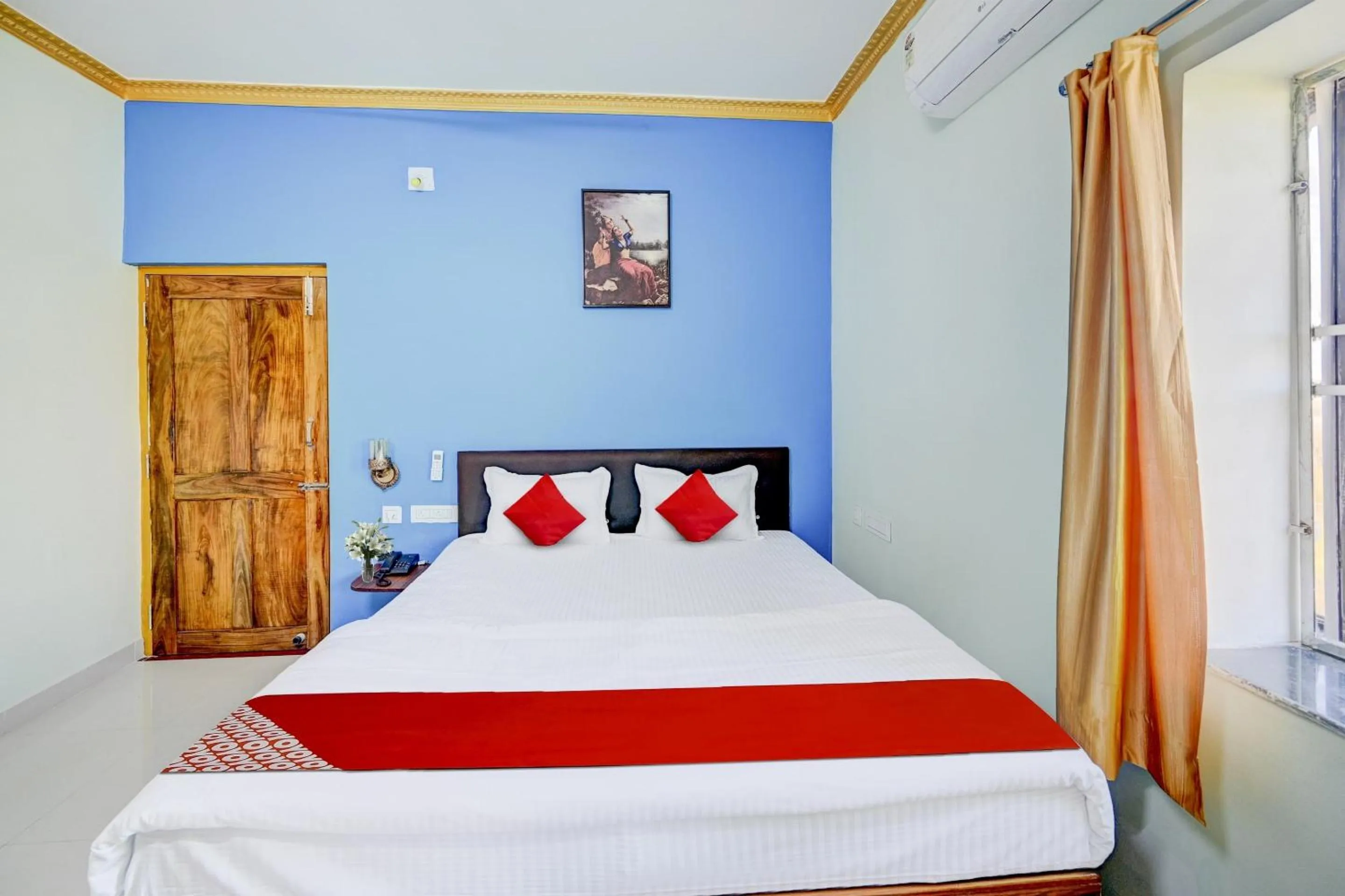 Bedroom in Hotel O GD STAY INN 1