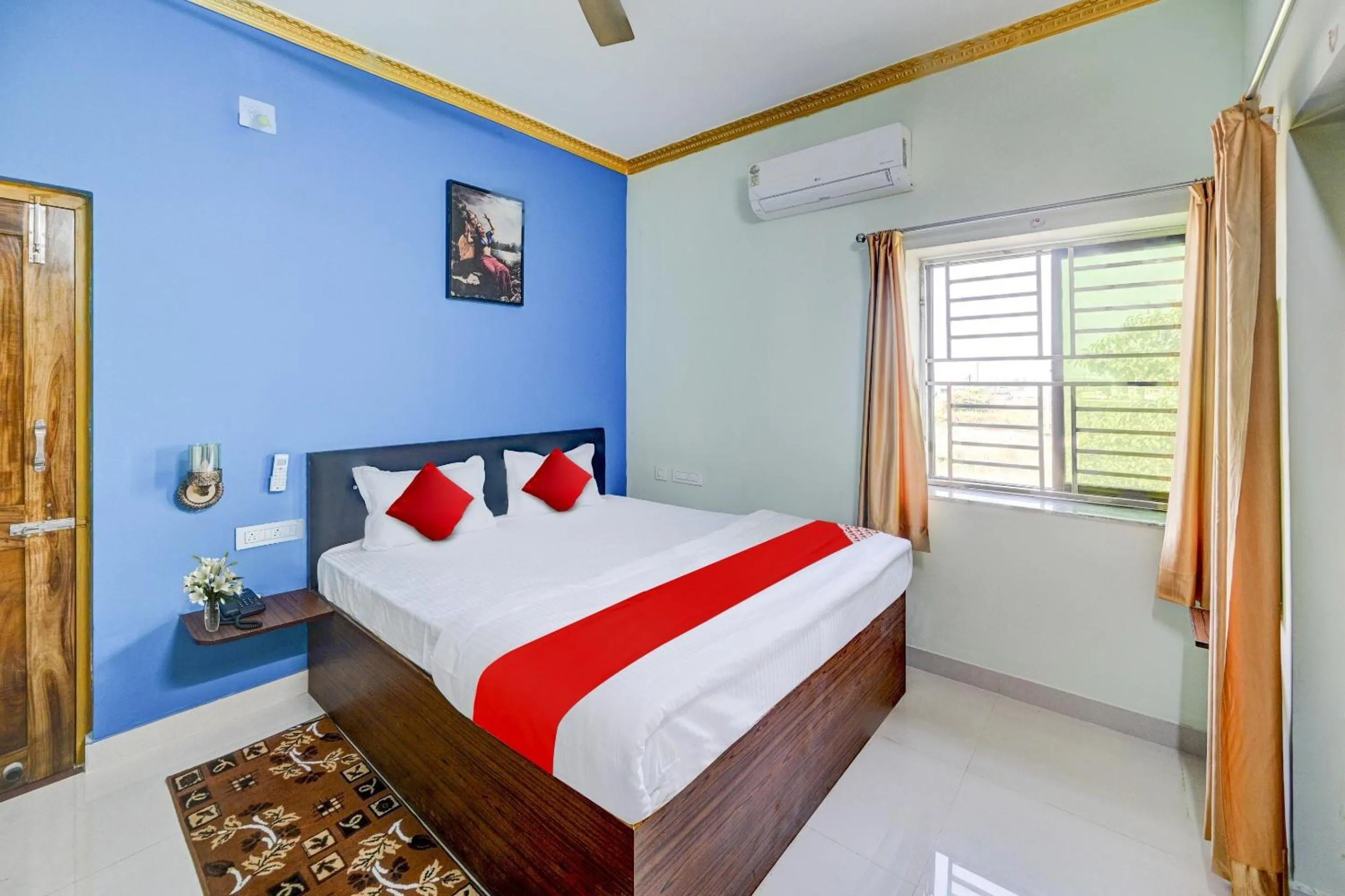 Bedroom in Hotel O GD STAY INN 1