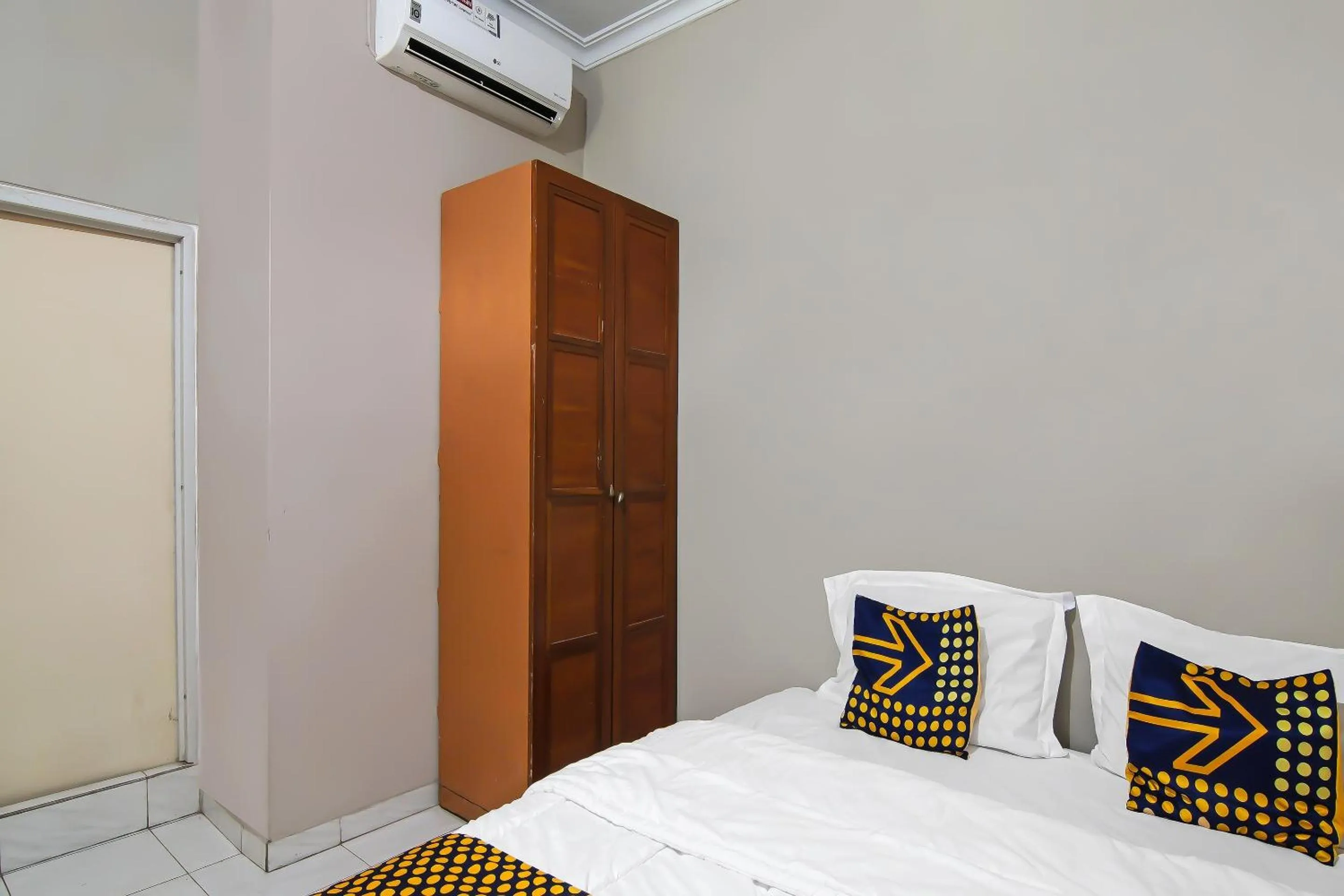 Bedroom, Bed in Hotel O Flamboyan 25 Homestay Syariah