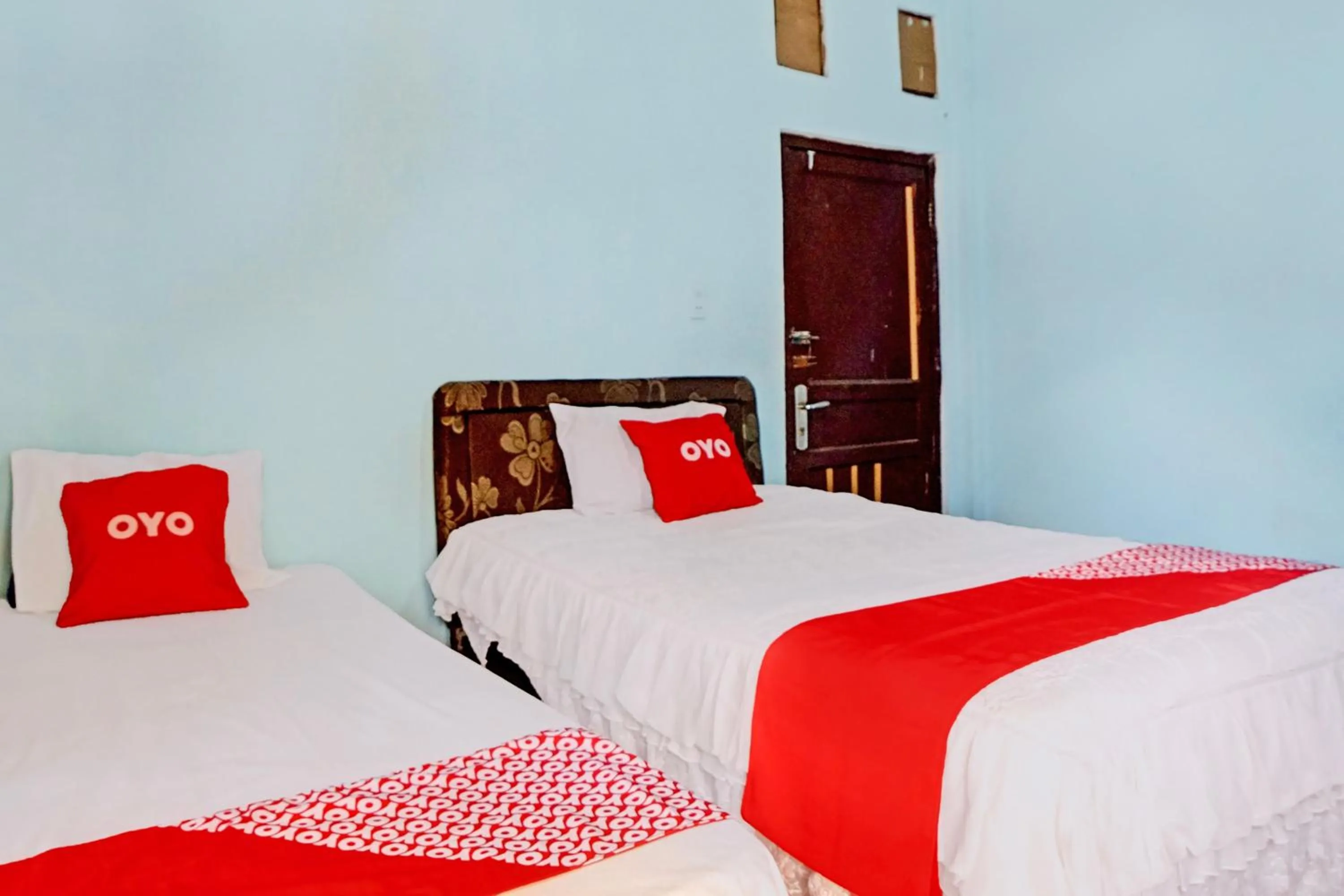 Bedroom, Bed in Hotel O Onasis Syariah Inn