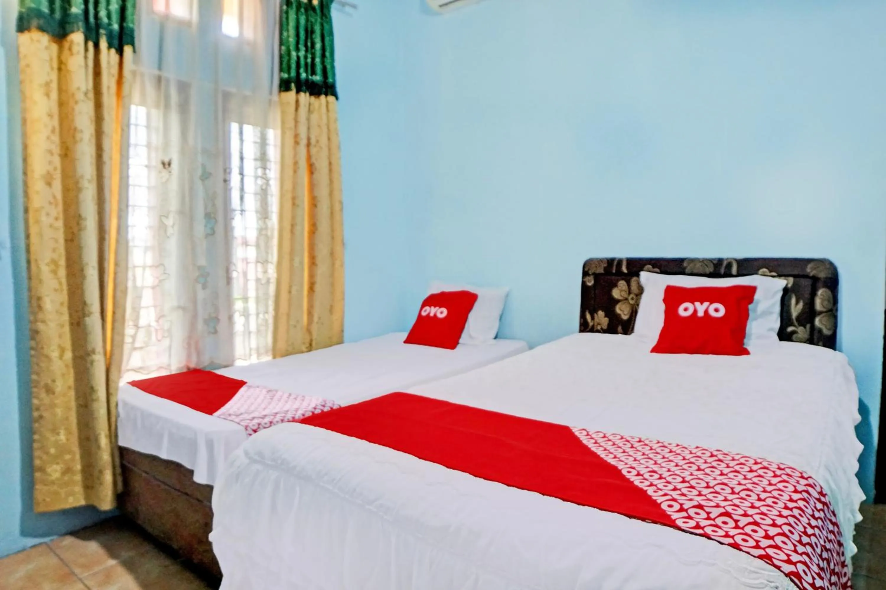 Bedroom, Bed in Hotel O Onasis Syariah Inn