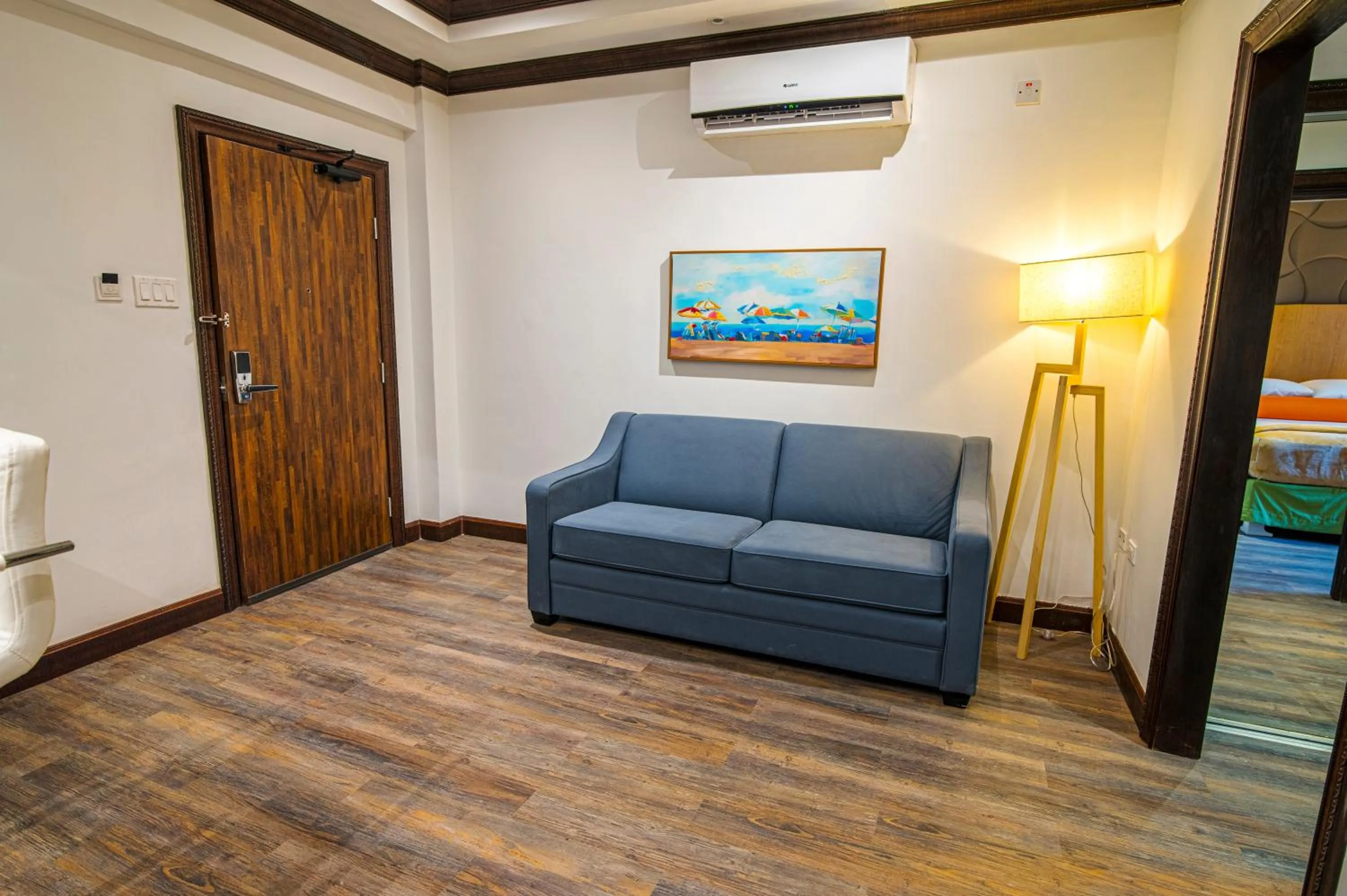 Bed in Sago Palm Hotel