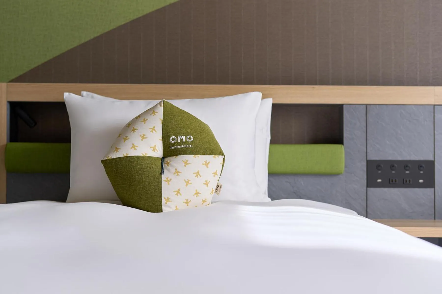 Bed in OMO Kansai Airport by Hoshino Resorts