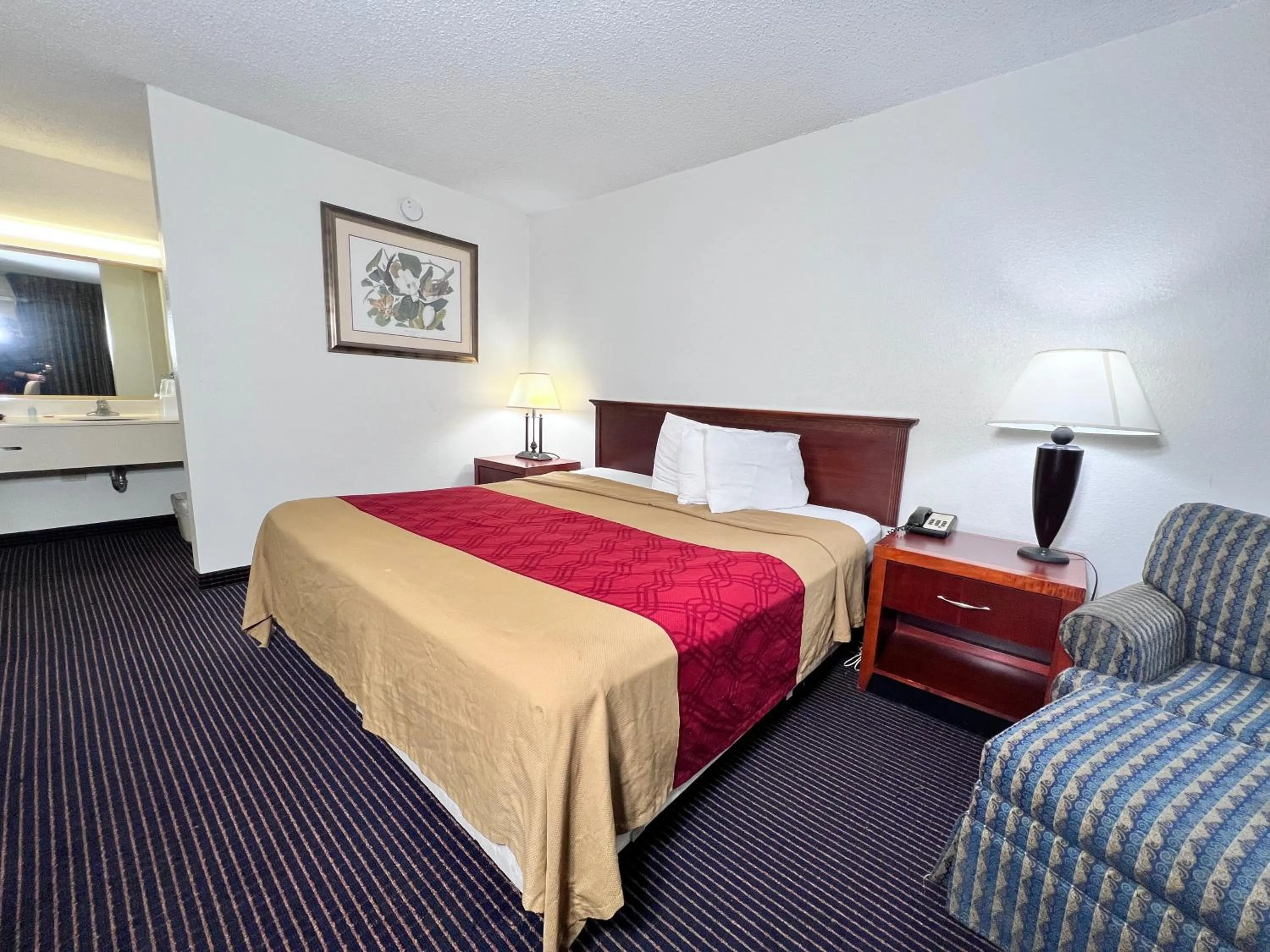 Bedroom, Bed in Heritage Inn & Suites by Capital O Baton Rouge I 10