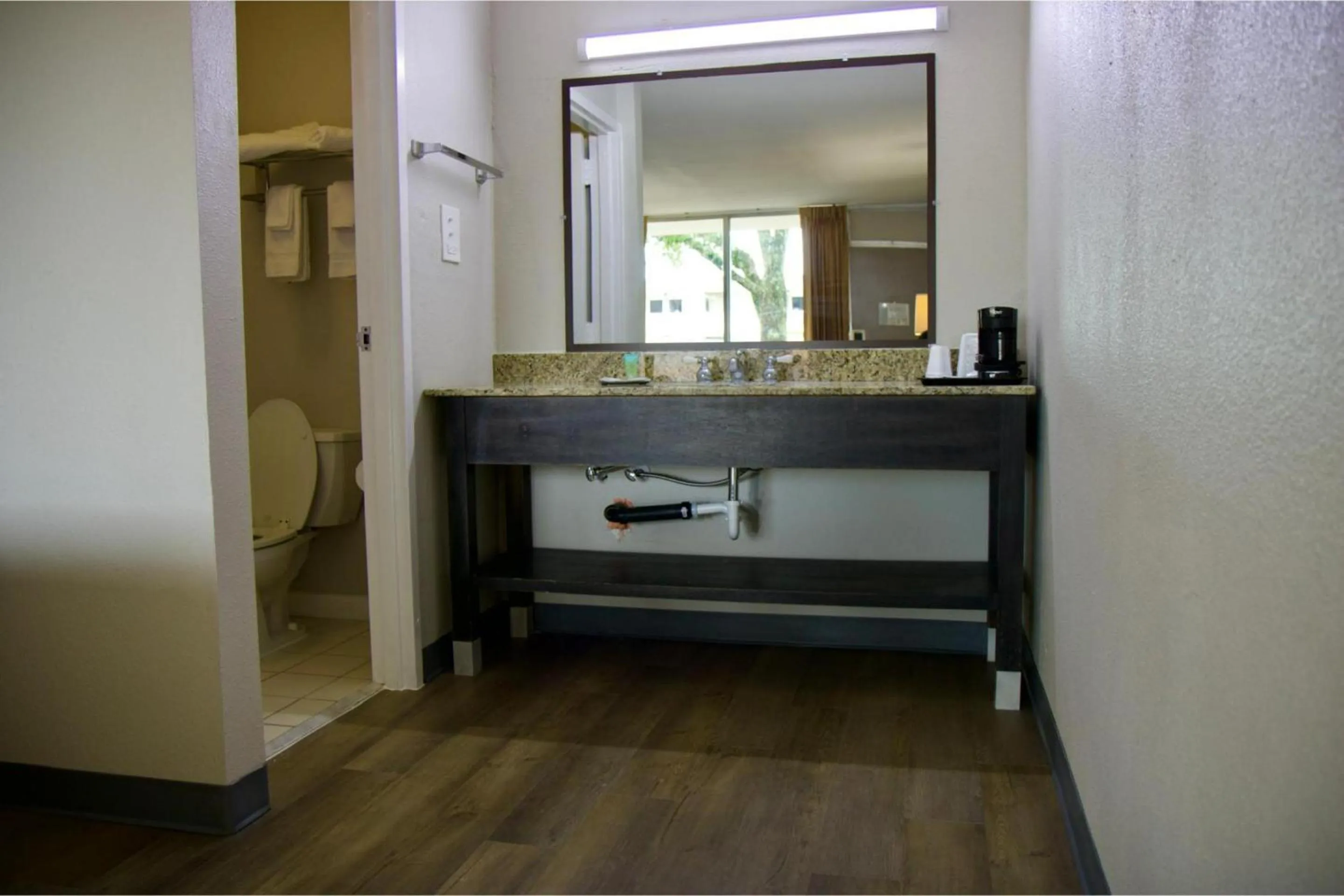 Bathroom in Heritage Inn & Suites by Capital O Baton Rouge I 10