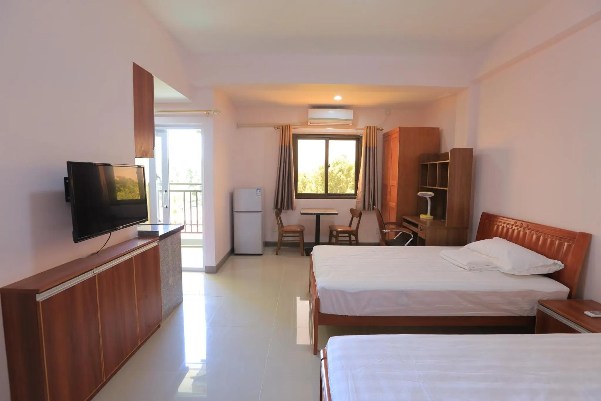 Bed in RUJIA Condotel Corp.