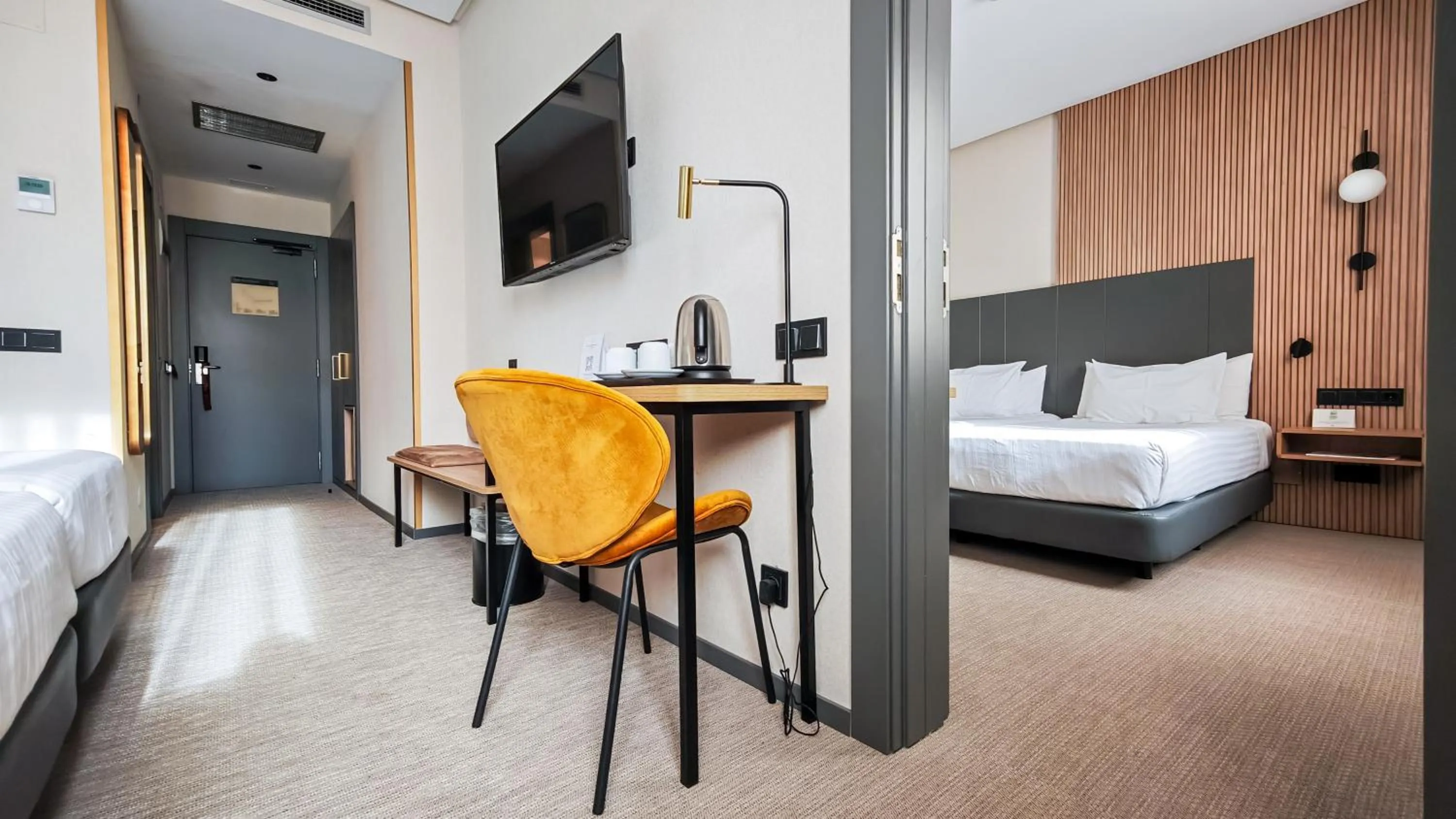 Photo of the whole room, Bed in Silken Ciudad Gijón