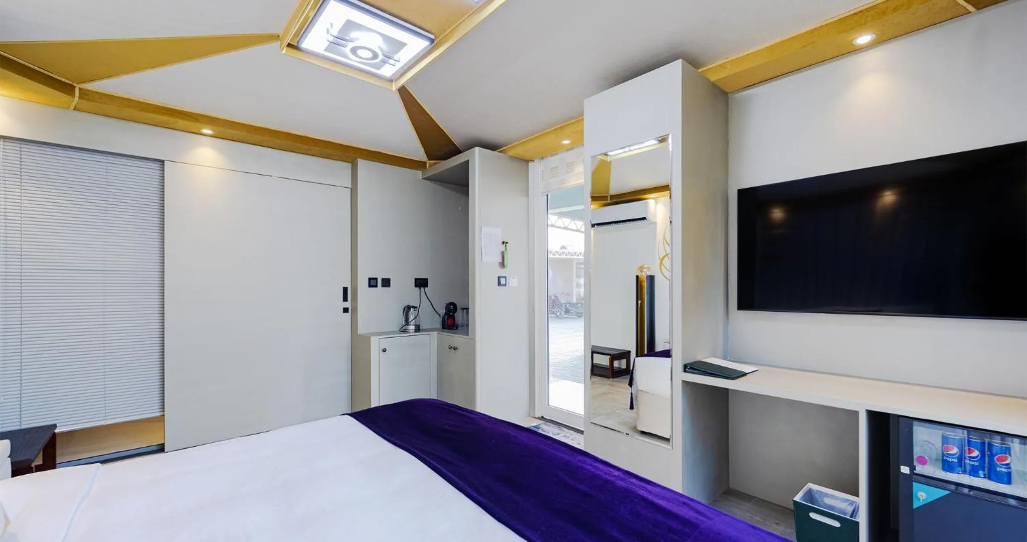 Bed in Nirvana Retreat By Patanjali Wellness Initiative