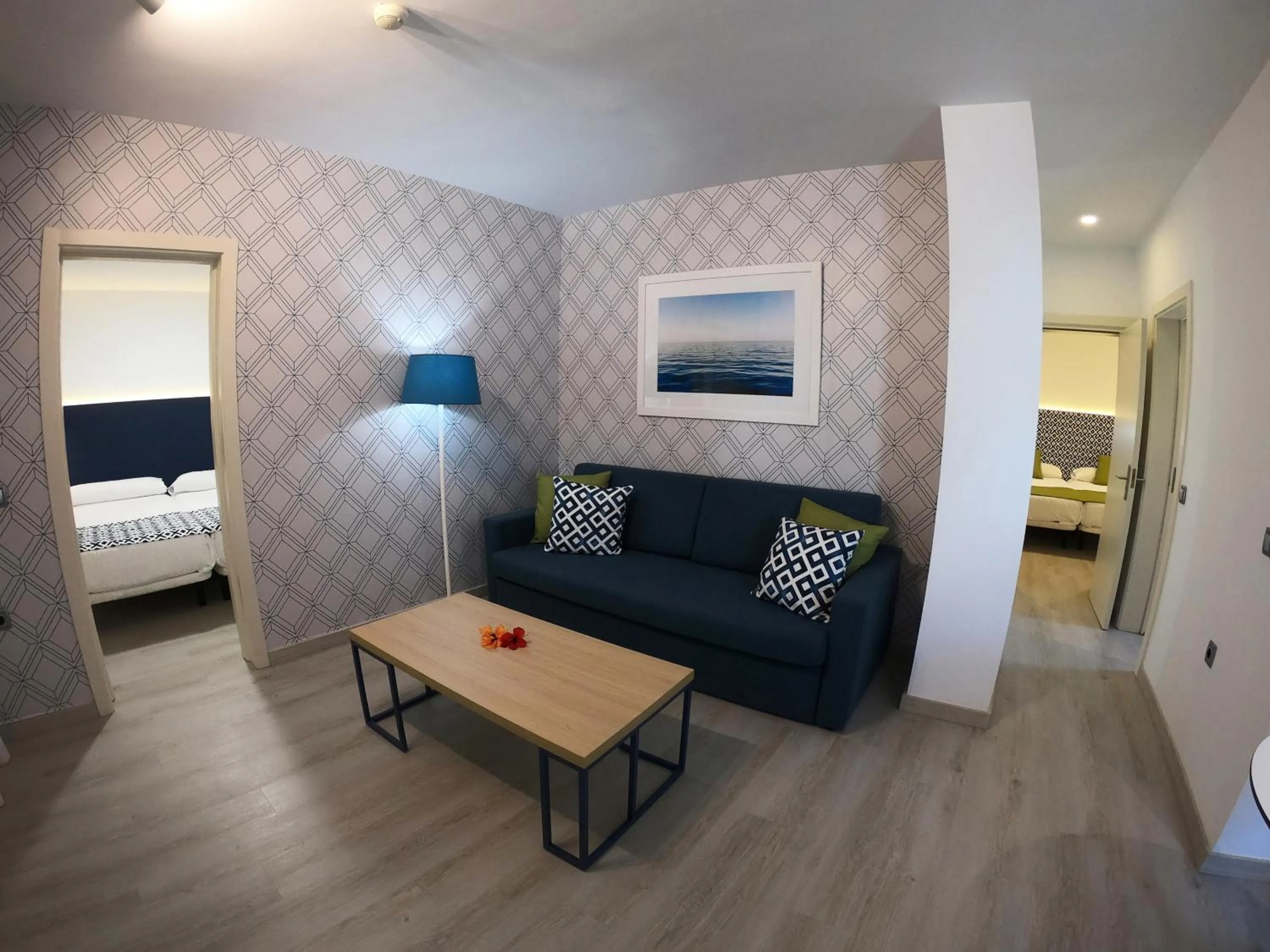 Living room, Bed in Broncemar Beach Suites