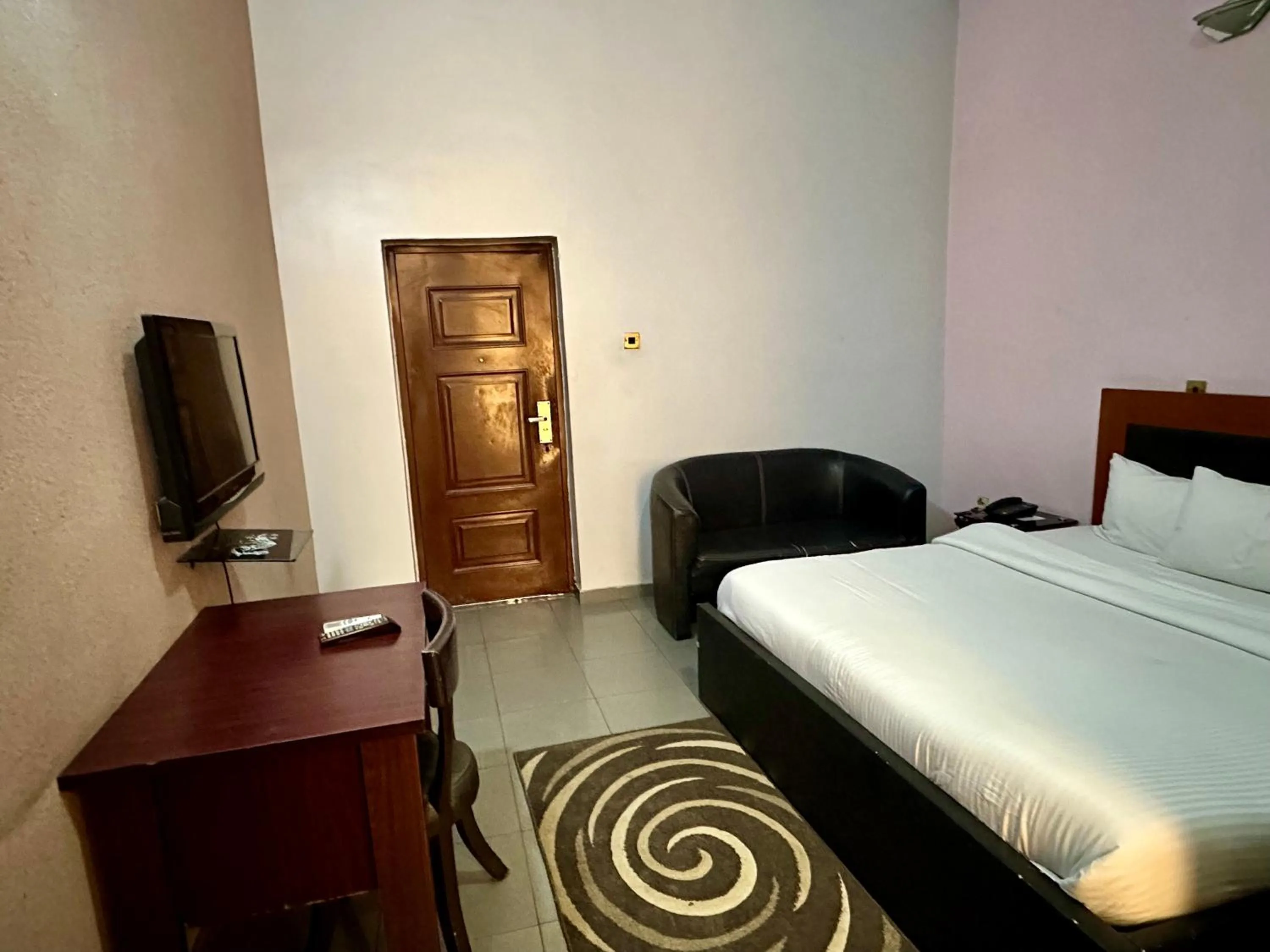 Bedroom in Whitehouse Msquare Hotel