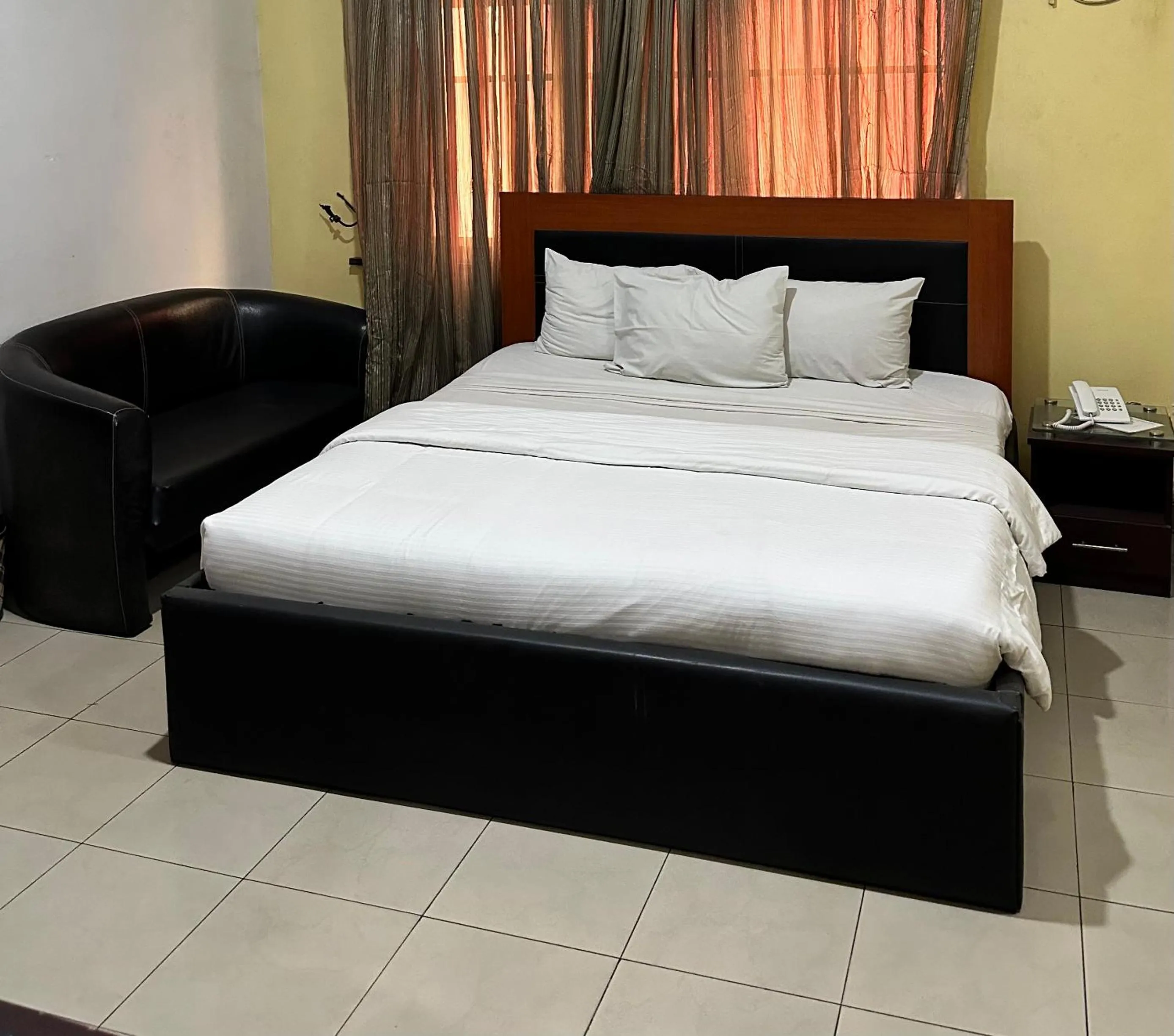 Bedroom in Whitehouse Msquare Hotel