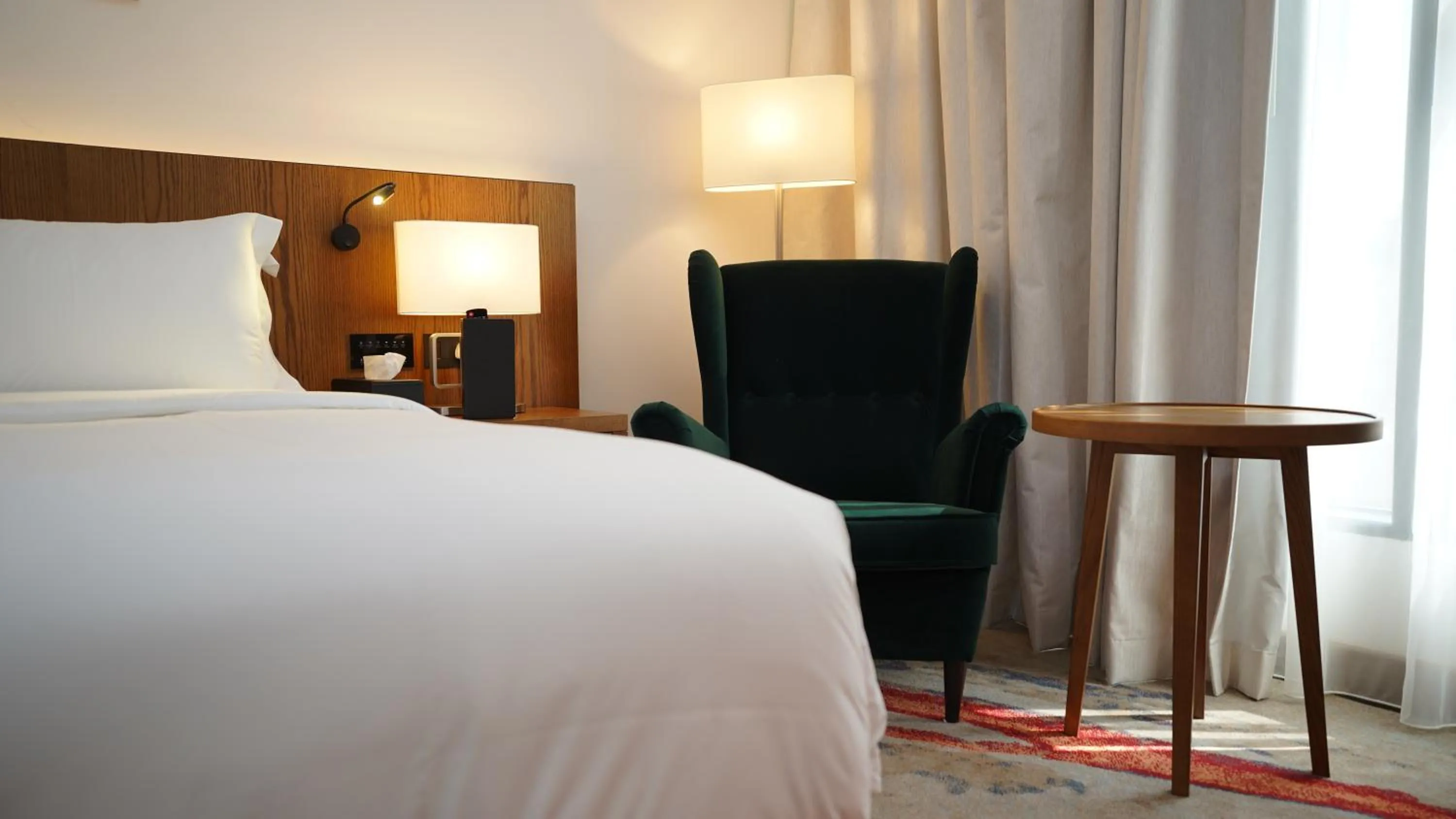 Bed in Jasmine Garden Hotel