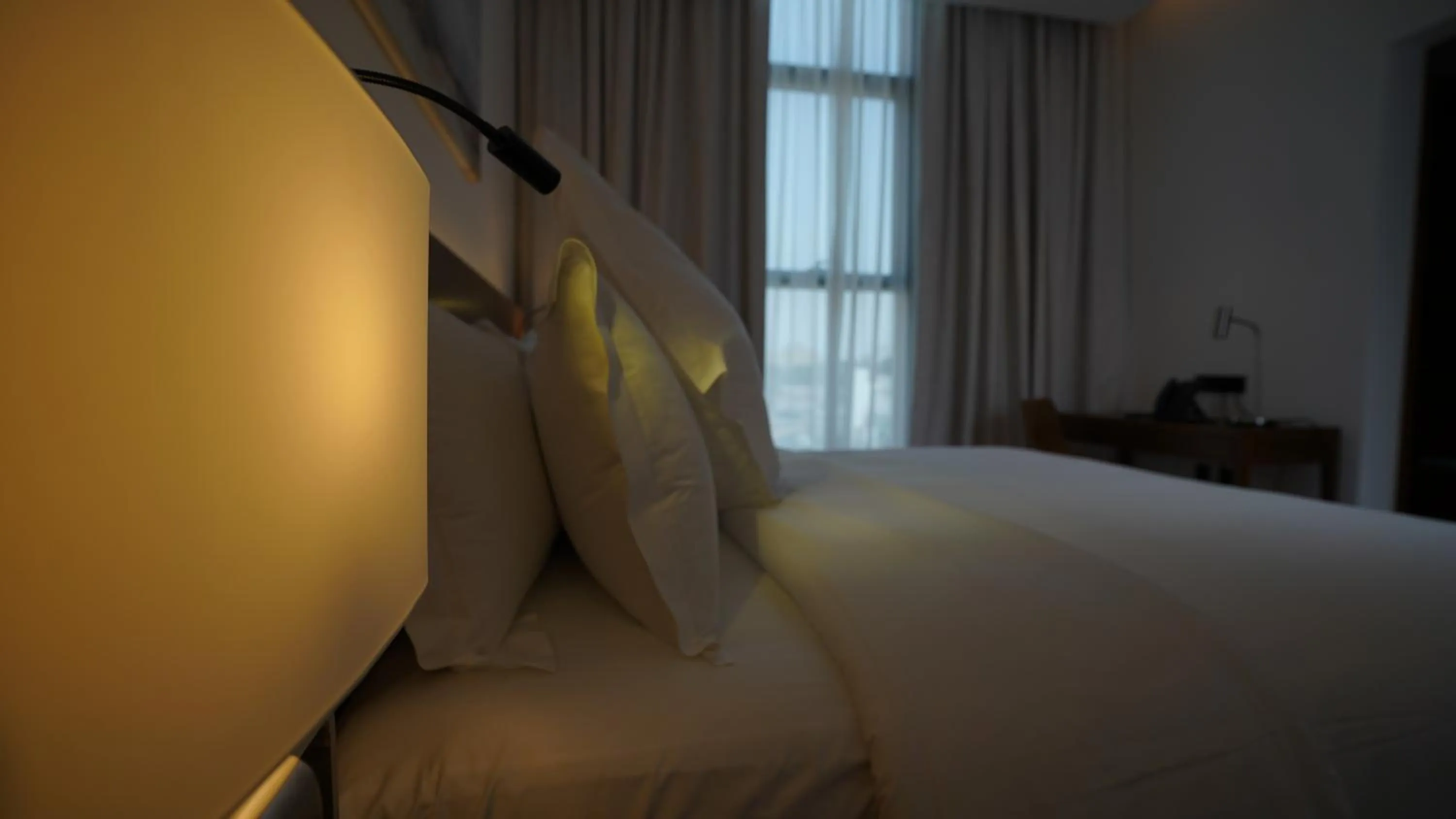 Bed in Jasmine Garden Hotel