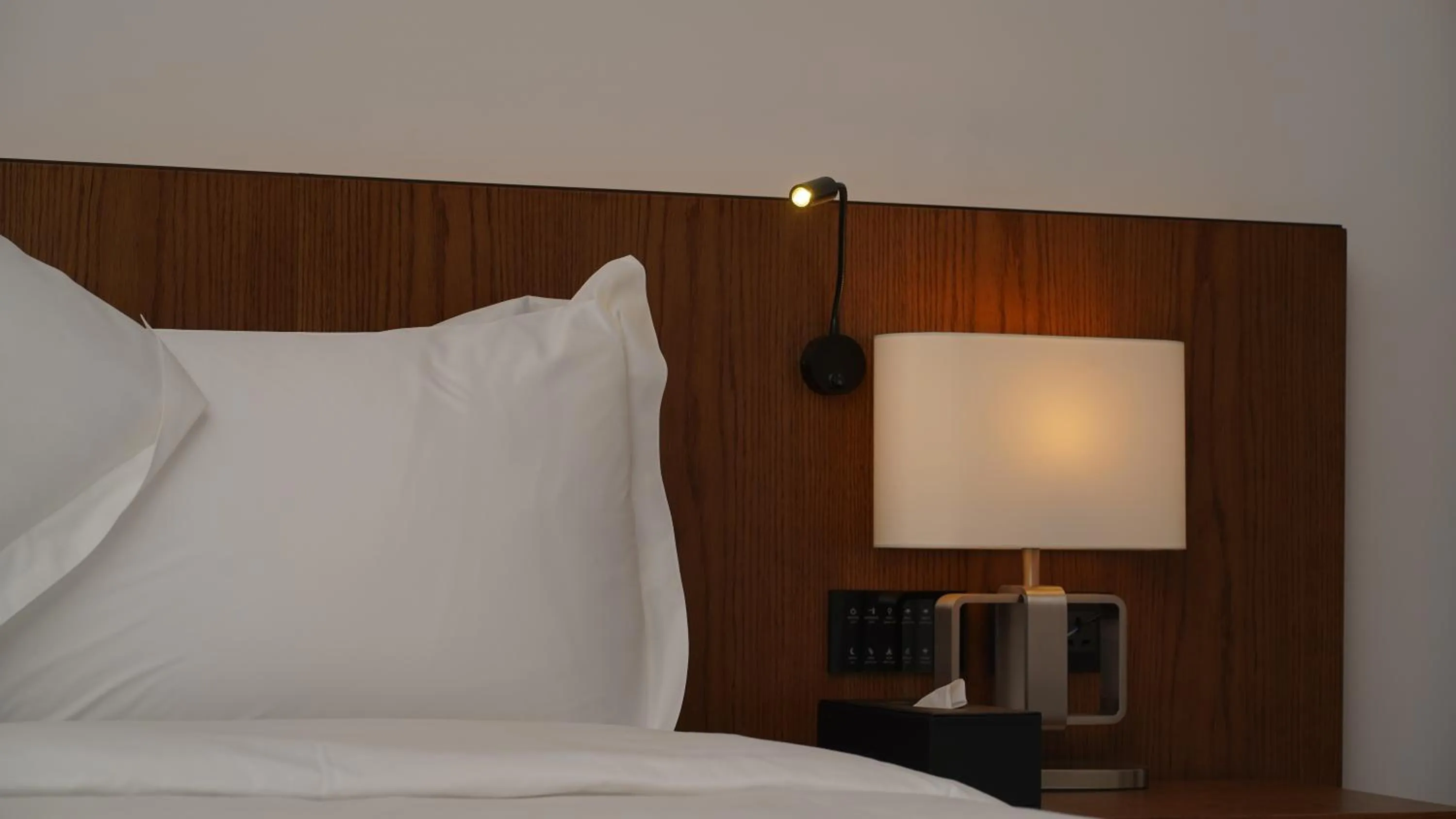 Bed in Jasmine Garden Hotel