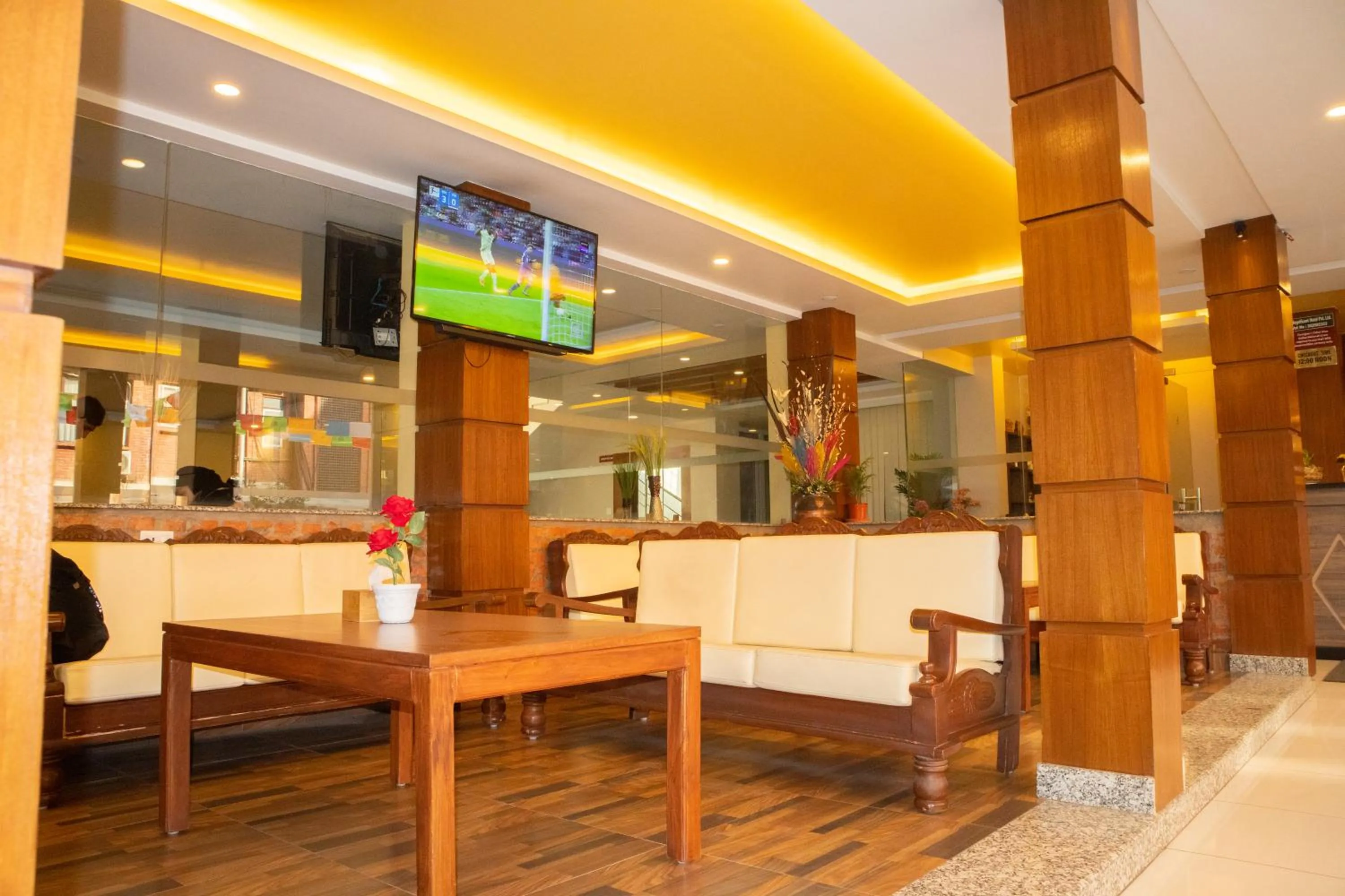 Communal lounge/ TV room in Magnificent Hotel