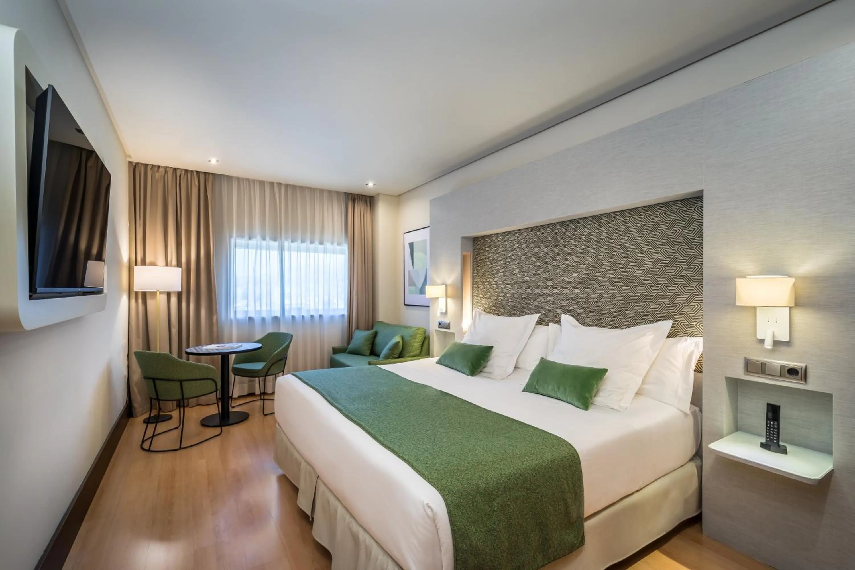 Bed in Barceló Granada Congress