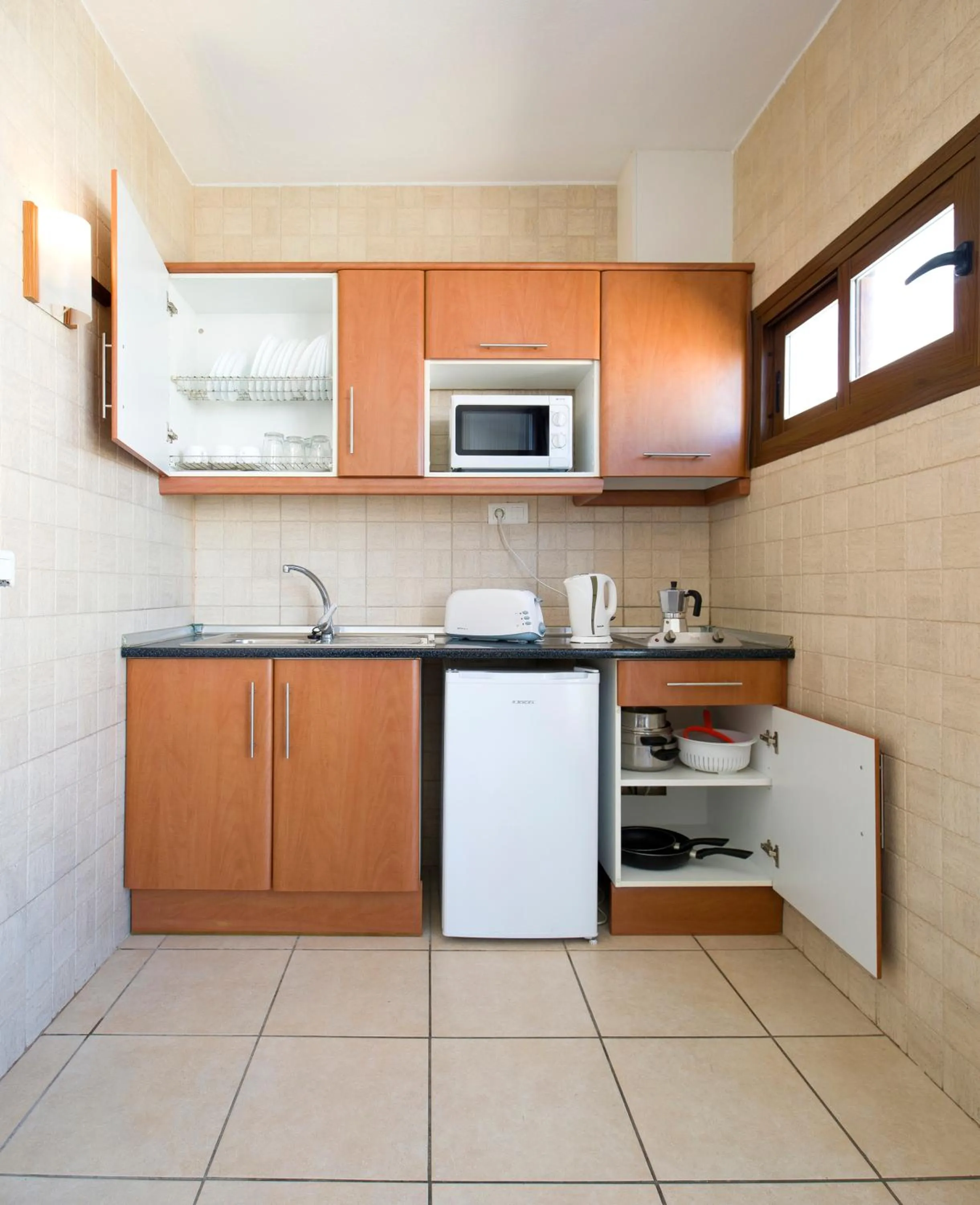 Kitchen or kitchenette in Apartamentos Tramuntana