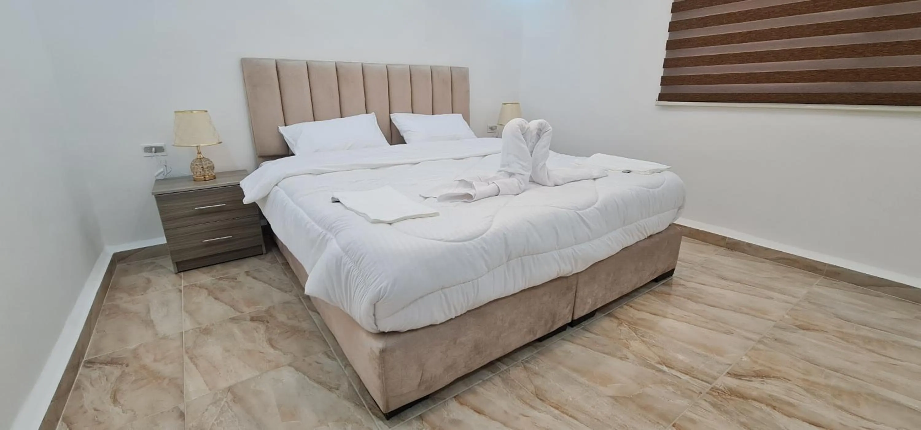 Bed in Nabateans Home Hotel