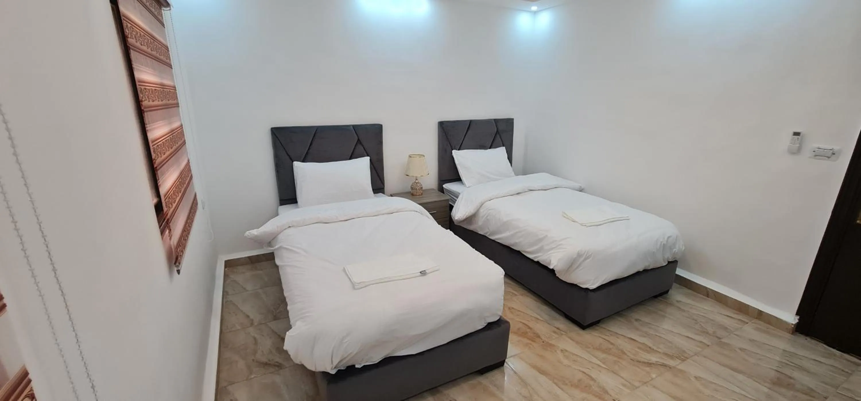 Bed in Nabateans Home Hotel