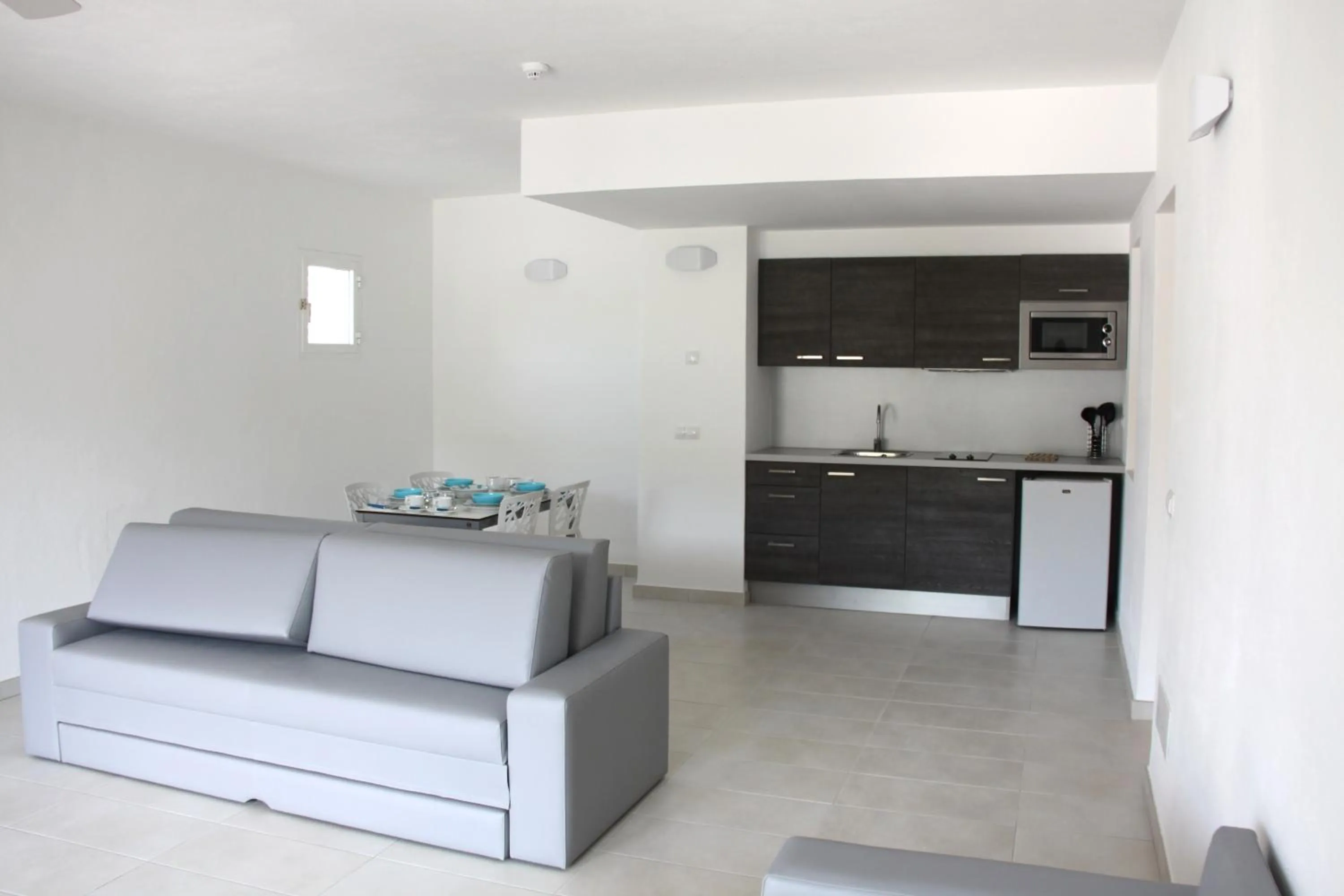 Kitchen or kitchenette in Aparthotel Puerto Cala Vadella