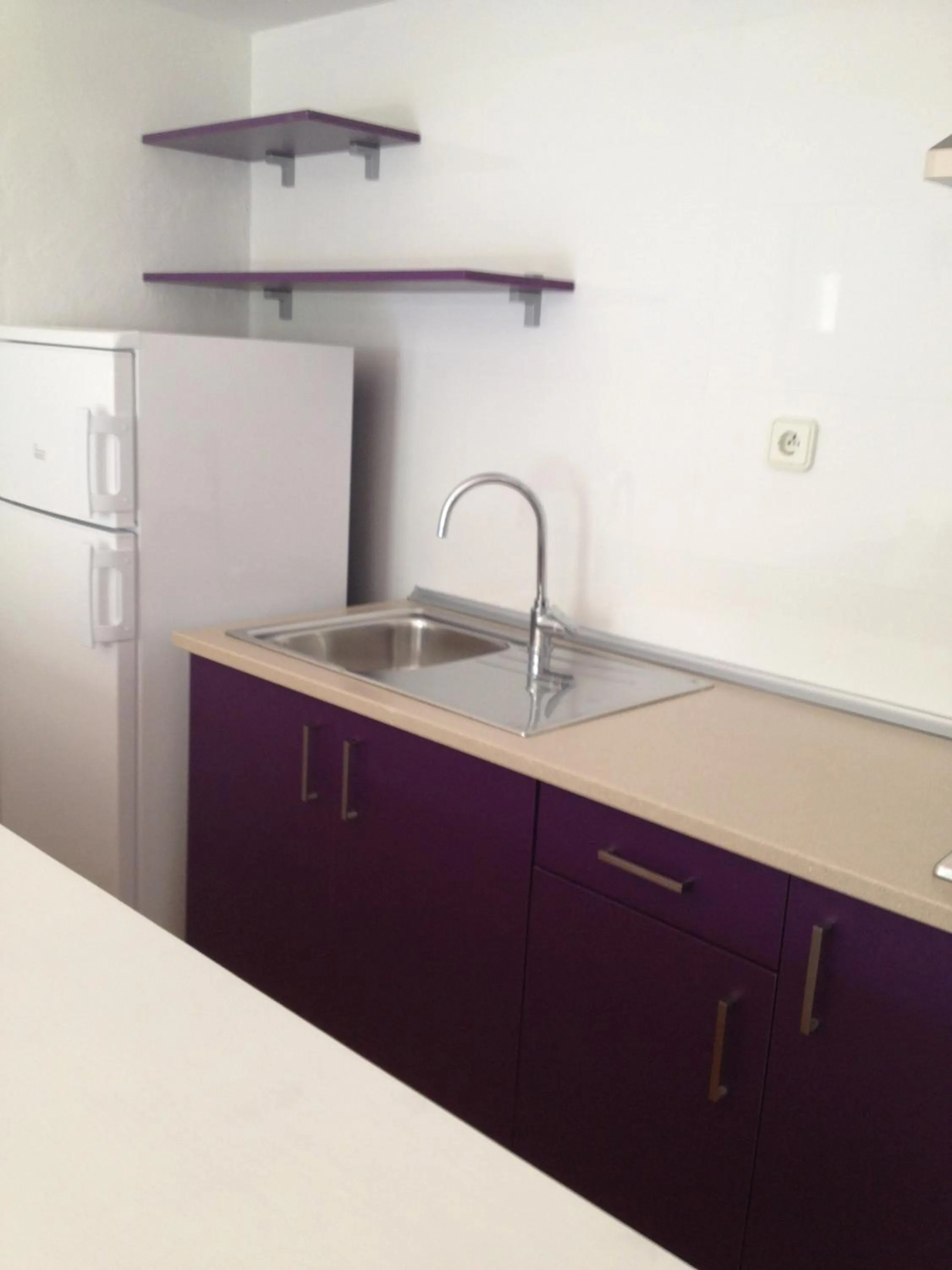 Kitchen or kitchenette in Aparthotel Puerto Cala Vadella